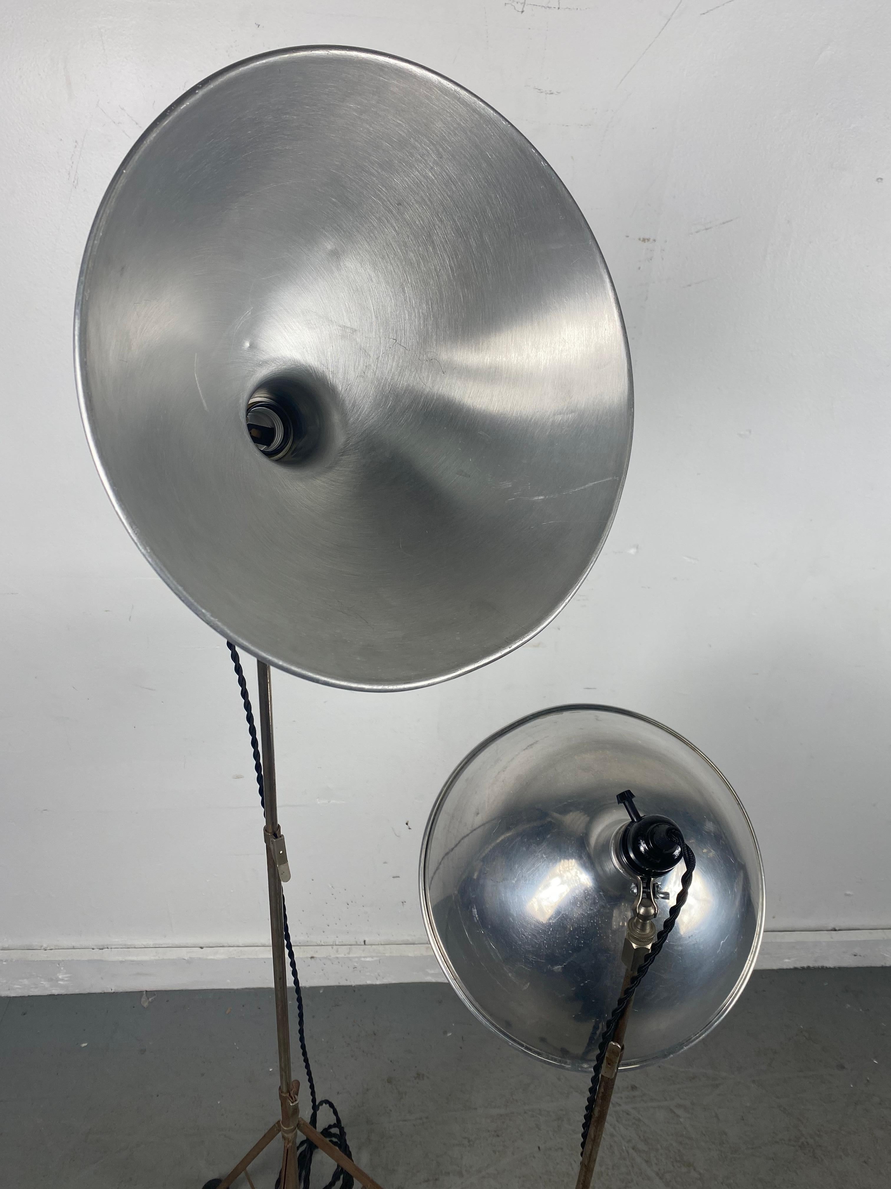 Pair vintage adjustable height photo lamps, industrial, atomic tri-pod base's. Adjustable height from 38