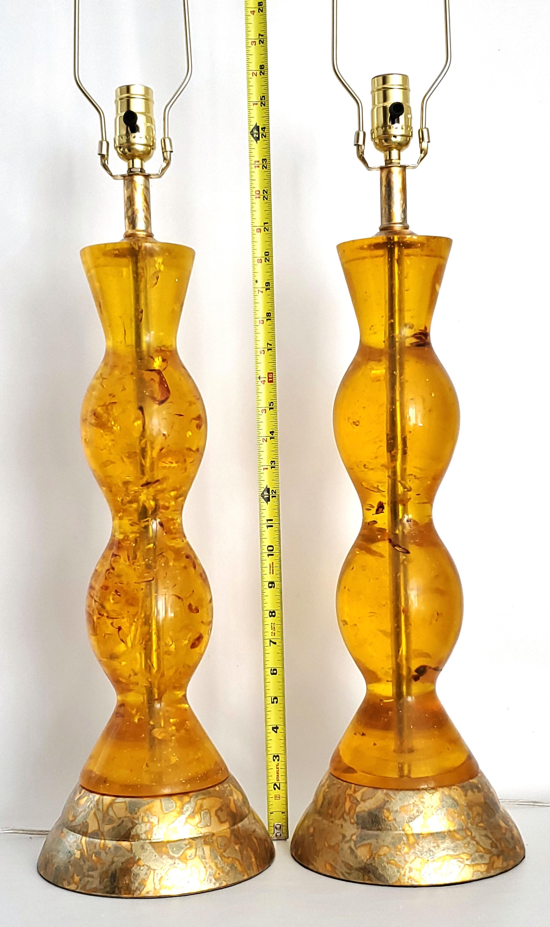 American Pair Vintage Amber Colored Lucite Table Lamps with Gold Leaf Bases and Finials For Sale