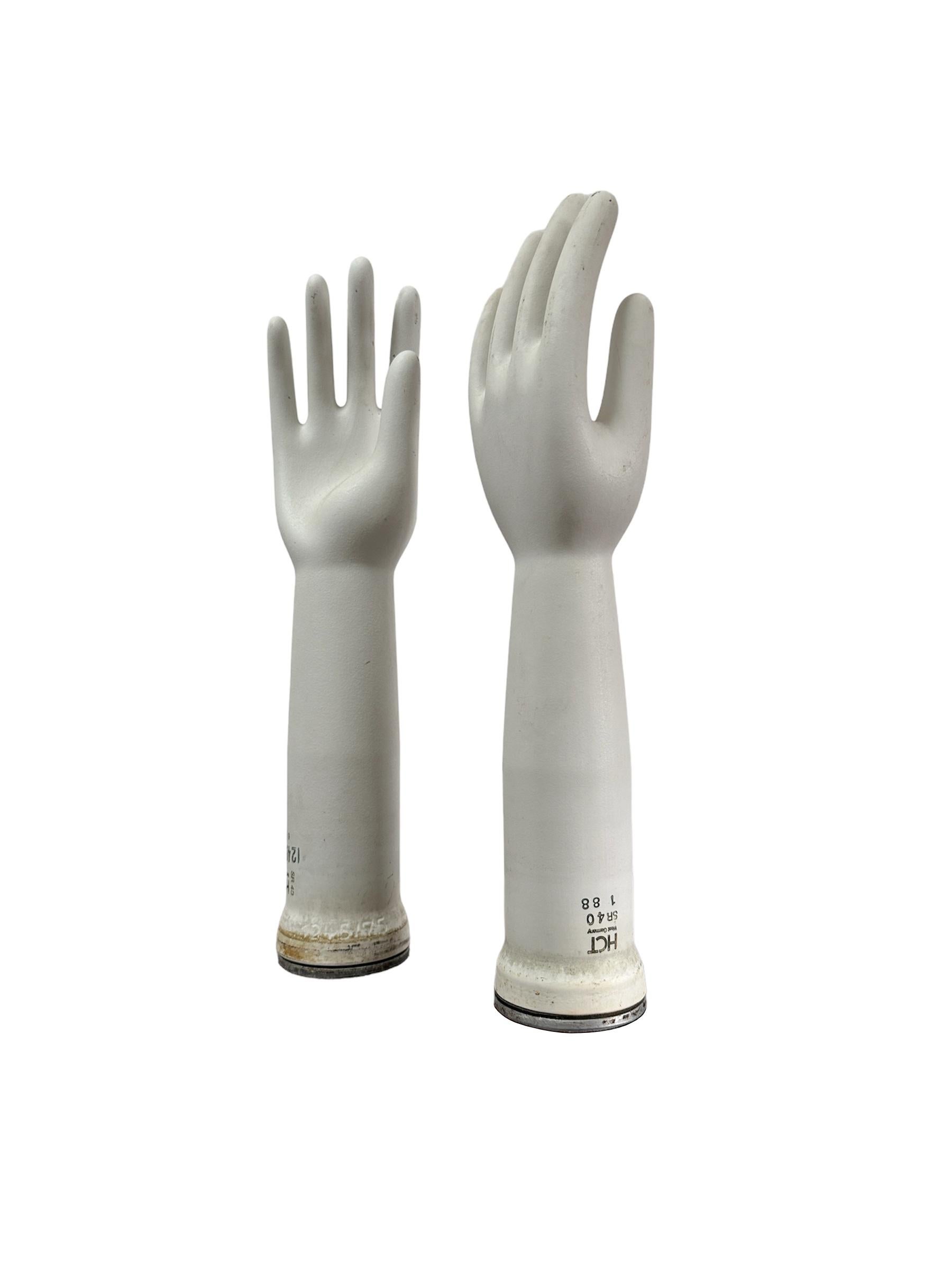 - A beautiful pair of original ceramic glove moulds with makers mark, Germany circa 1940.
- Both of the matching moulds are constructed from a quality porcelain, stamped at the bottom with their makers marks, steel discs to the underneath and where