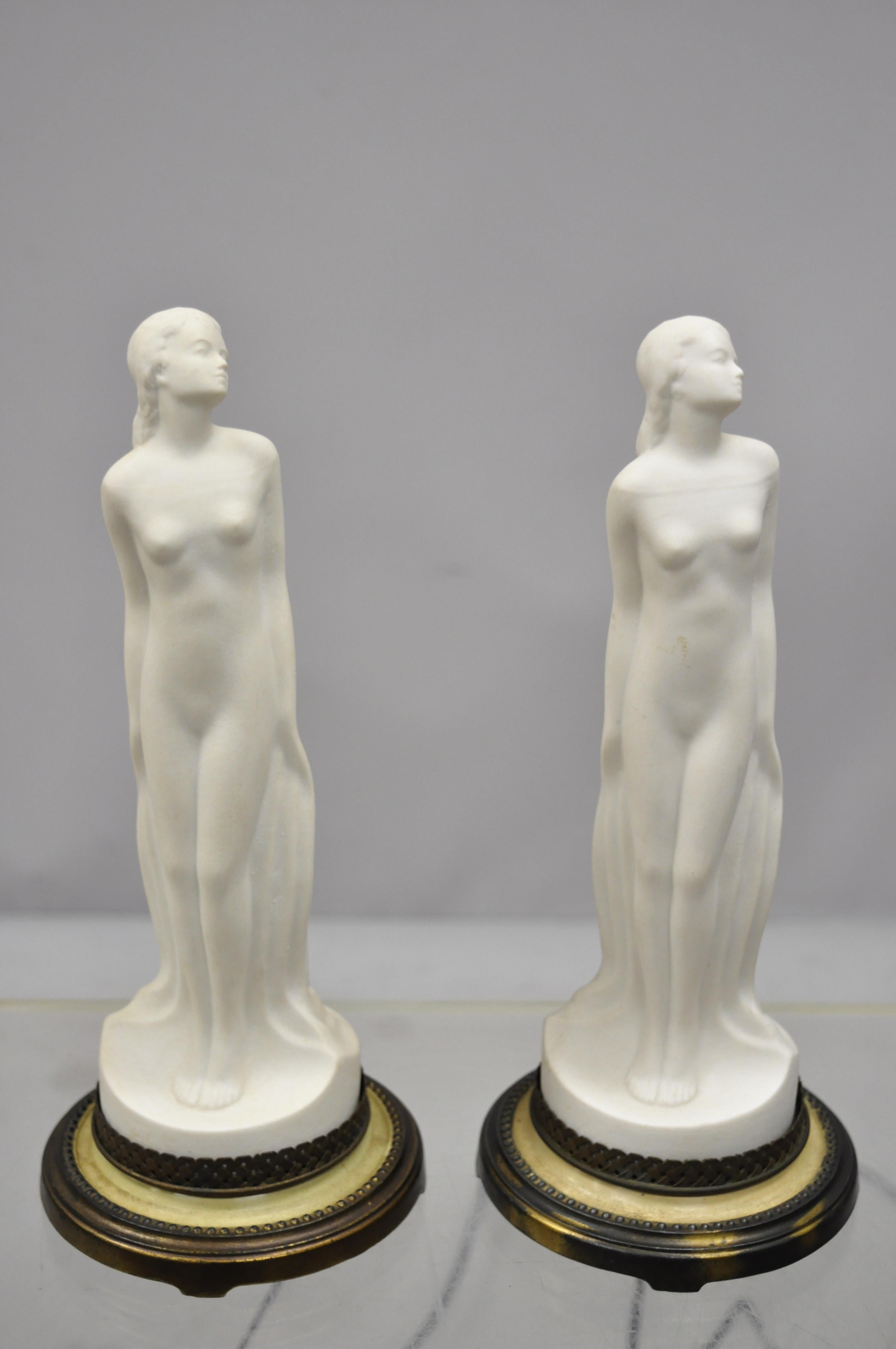 Pair of vintage Art Nouveau French style ceramic figural woman Boudoir table lamps. Listing includes ceramic figural female forms, single light socket, metal base, very nice vintage item, great style and form, circa mid-20th century. Measurements: