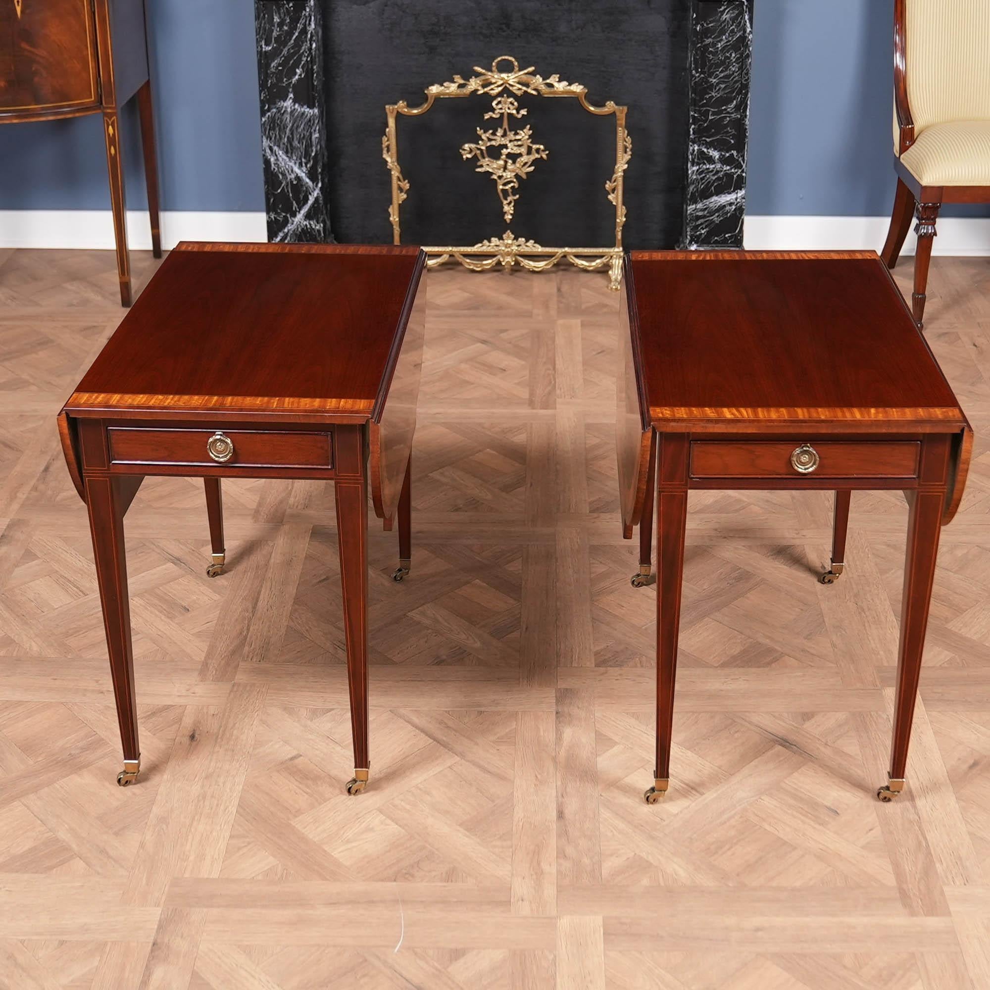 This beautiful PAIR Vintage Baker Pembroke Tables will be recognizable to anyone familiar with fine antique furniture. Originally designed by Henry Herbert, 9th Earl of Pembroke, this form of table was made popular by various furniture designers in