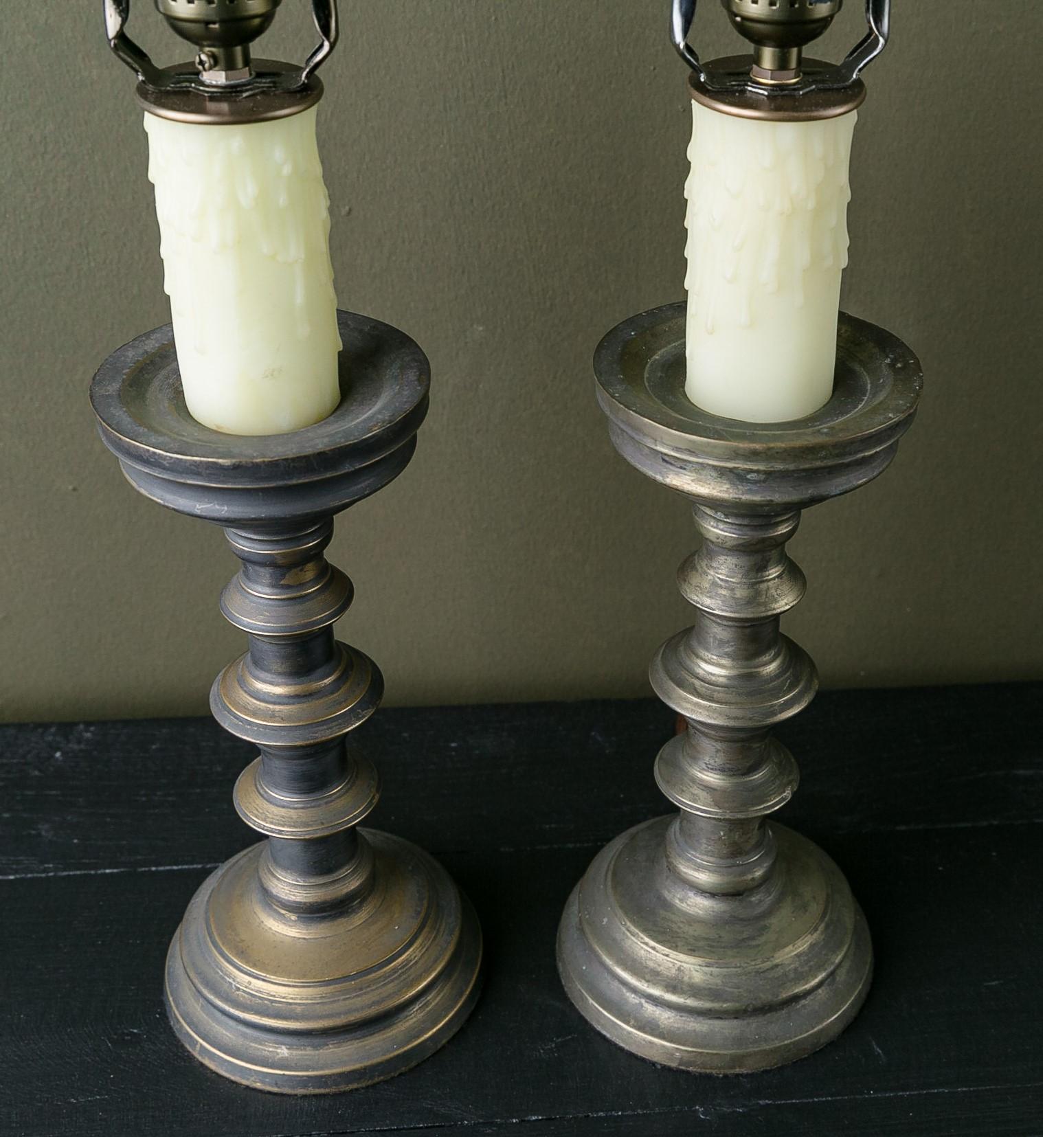 This pair of lamps has a beautiful patina and they are newly wired for the US market. They have a classic or perhaps colonial feel. They would be at home with French, English or American style interiors.