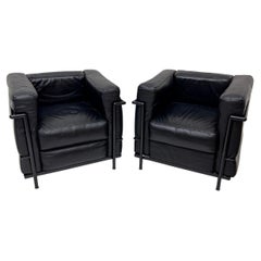 Pair Vintage Black leather Black frame lounge chairs style of Le Corbusier LC2