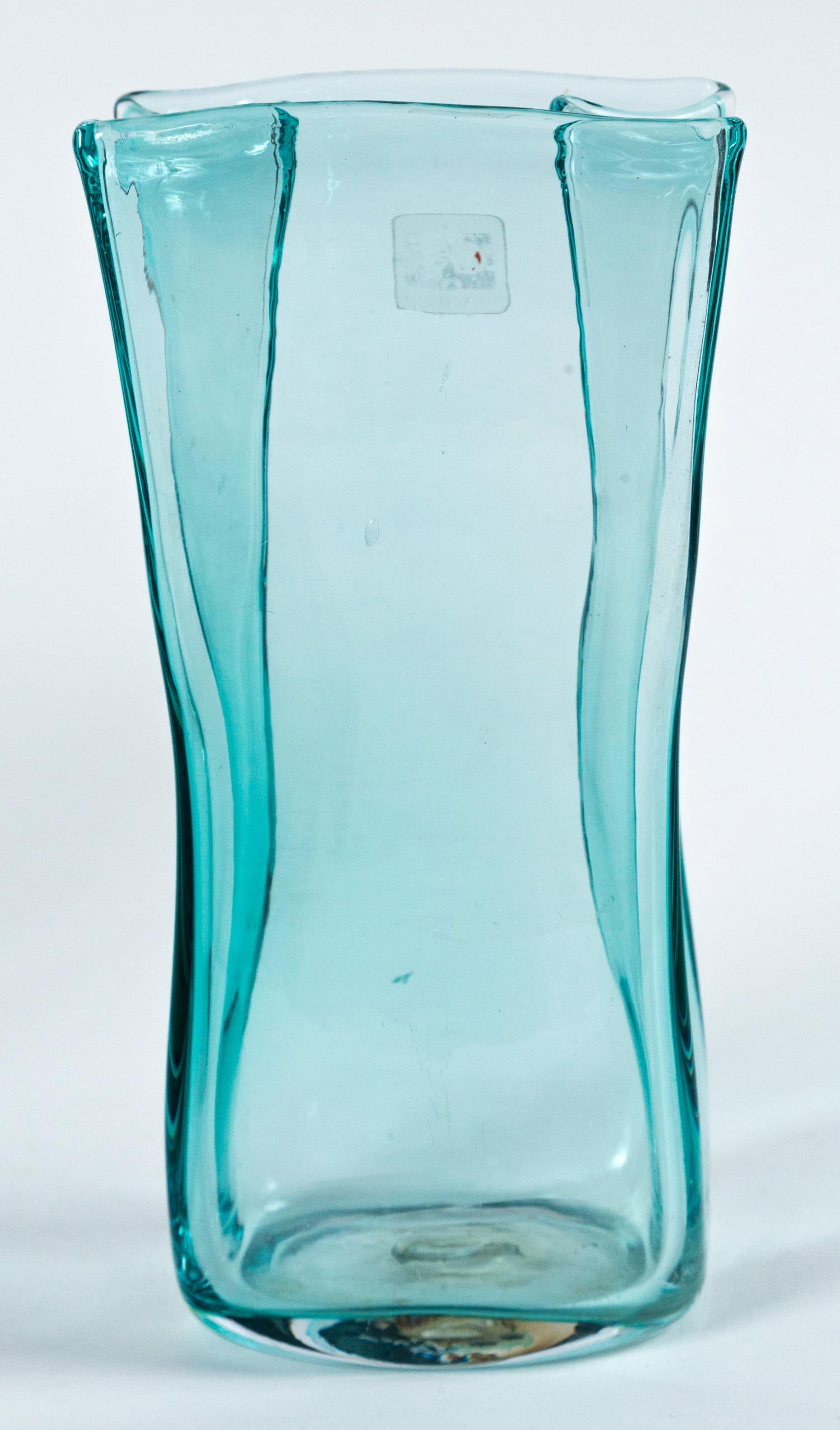 Pair of vintage Blenko glass vases, circa 1960's. Hand-blown aquamarine glass. Distinctive shape that mimics a paper bag. Original label. Blenko glass manufacturer started in 1893, located in Milton, W. Virginia.