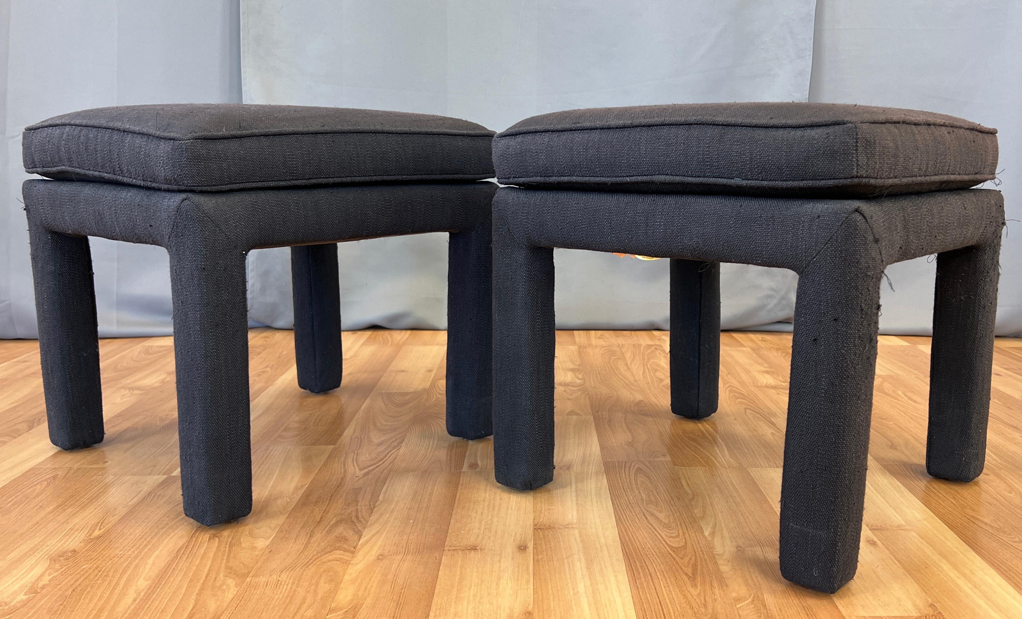 A pair of 1990s vintage Parsons style ottomans in a Milo Baughman design style, that was sold by Breuners.
A nice look and a perfect size for easy extra seating or just to put you feet up, both just waiting for a new fabric
to match your decor.
 