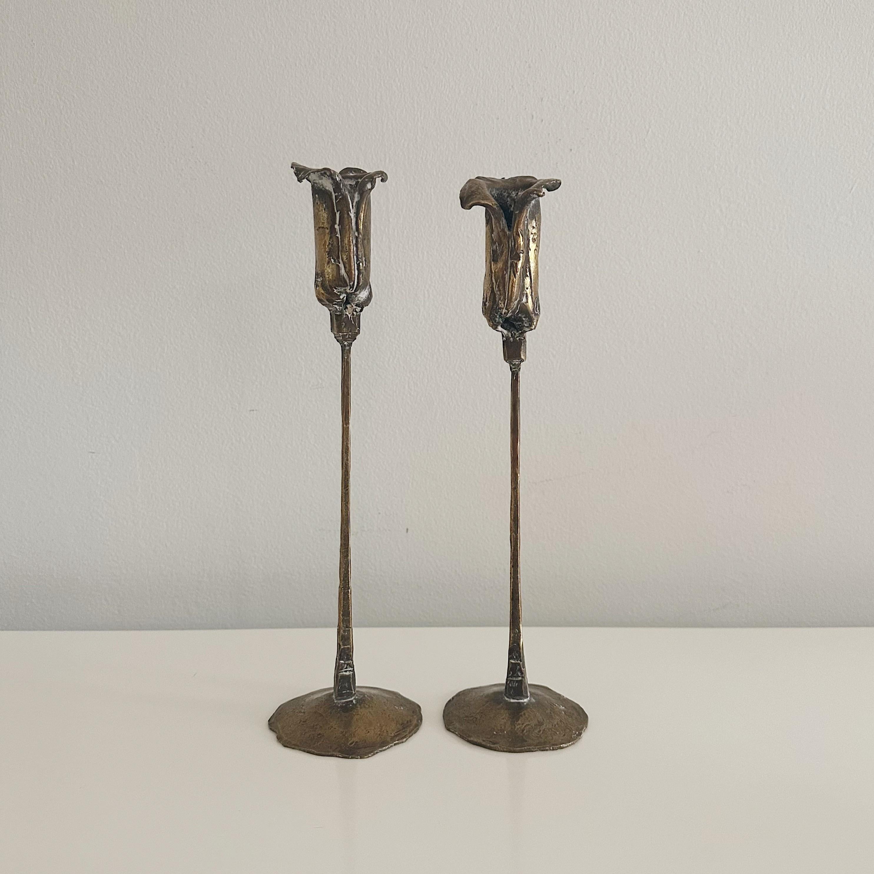 Pair hand done, Mid Century brutalist bronze candle holders, signed with illegible signature.