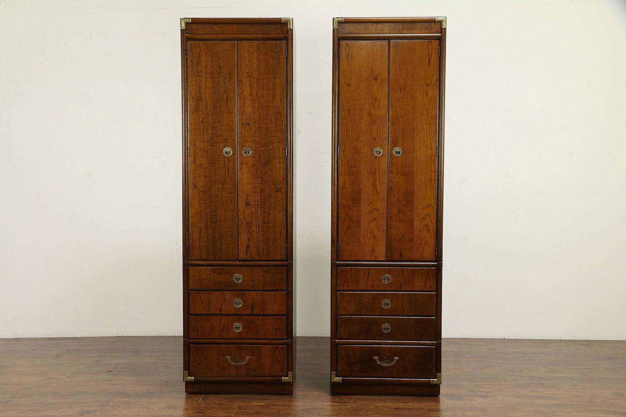 Pair of armoires, wardrobes or closets are in the traditional 