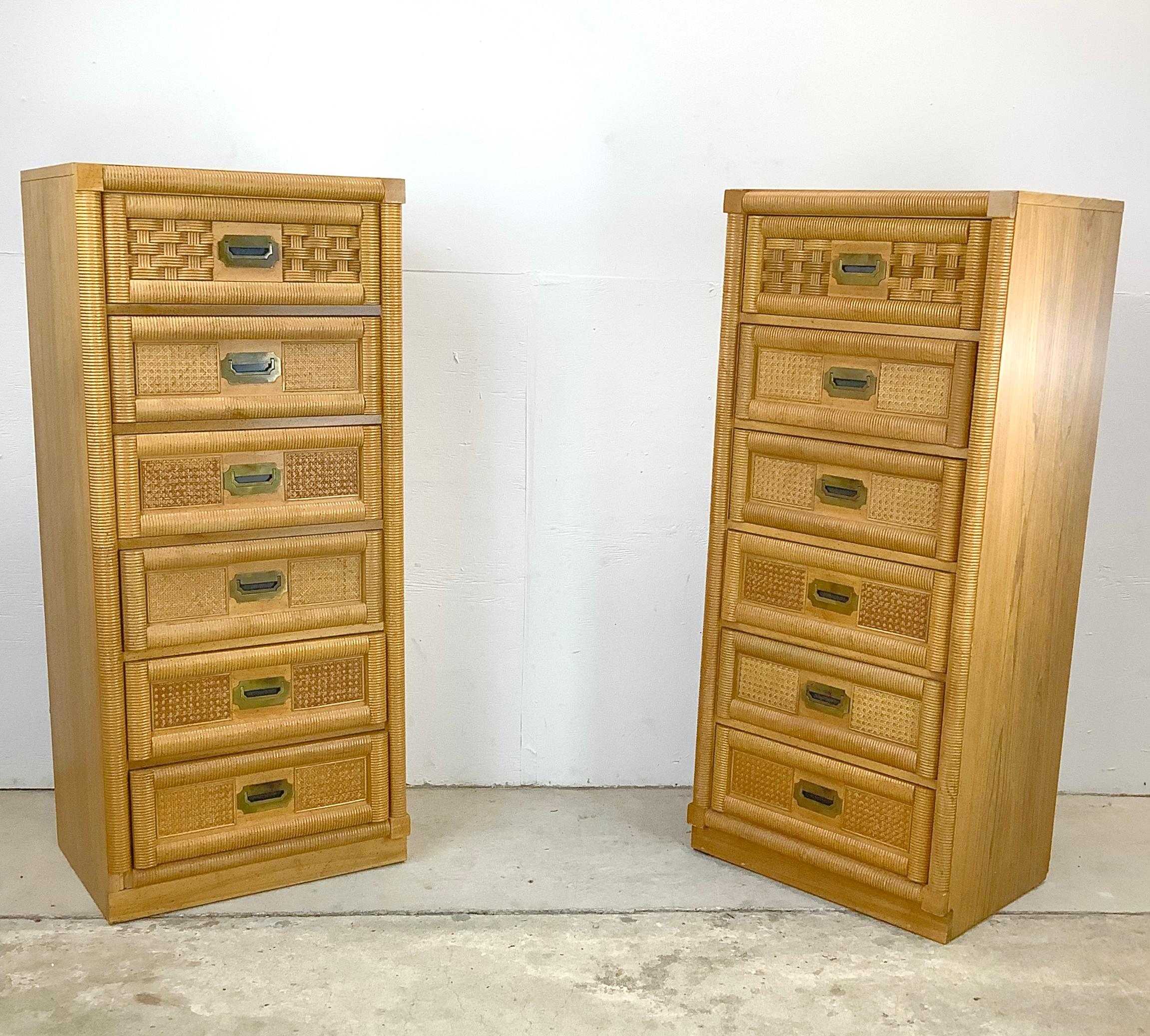 This elegant pair of Vintage Lingerie Chests crafted by Dixie Furniture, feature faux bamboo accents and eye catching campaign hardware that seamlessly combine style and functionality. These tall matching chests are designed to enhance your bedroom