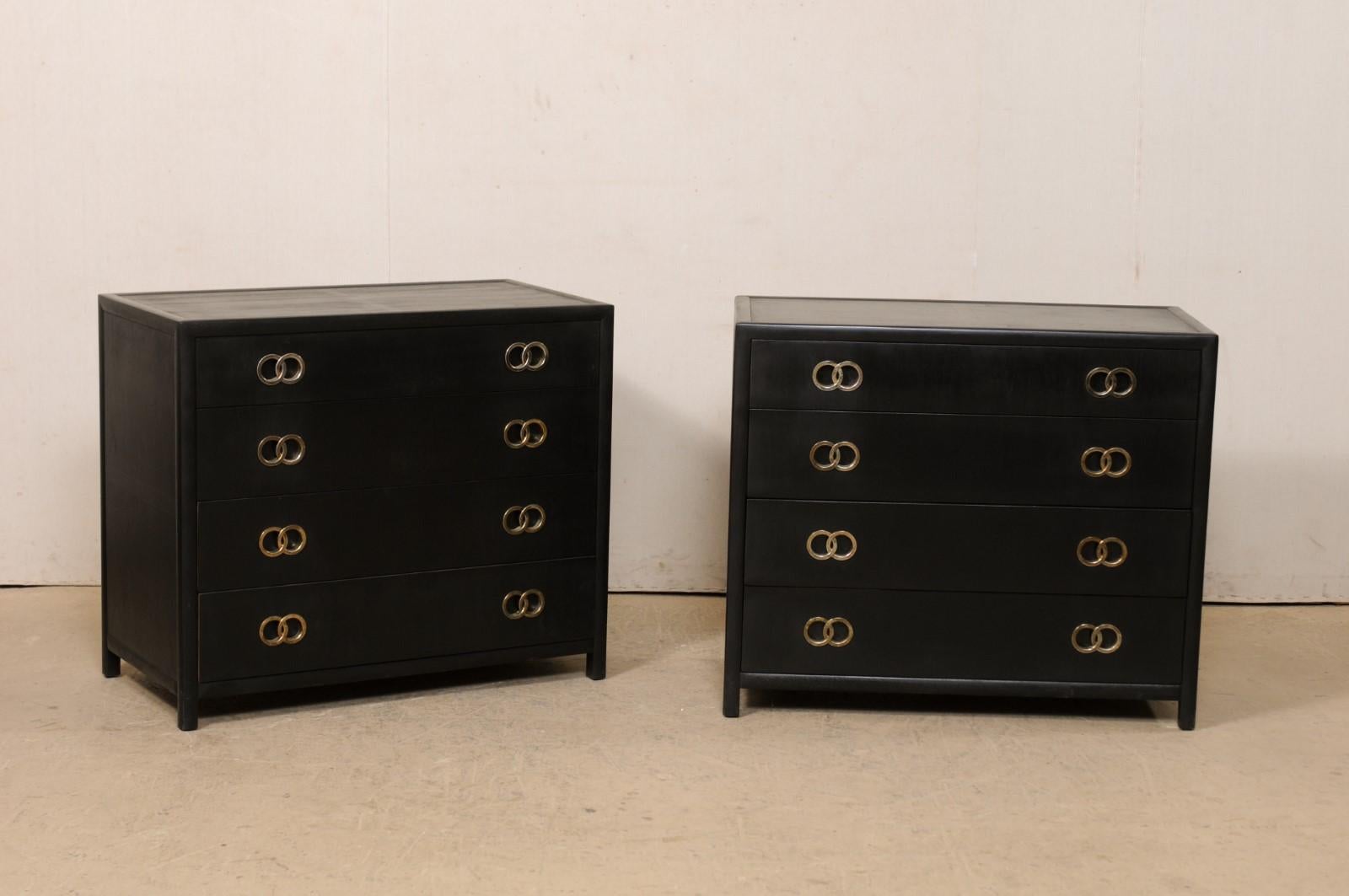 A pair of modern designed American painted wood four-drawer chests. These vintage chests from American furniture makers, 