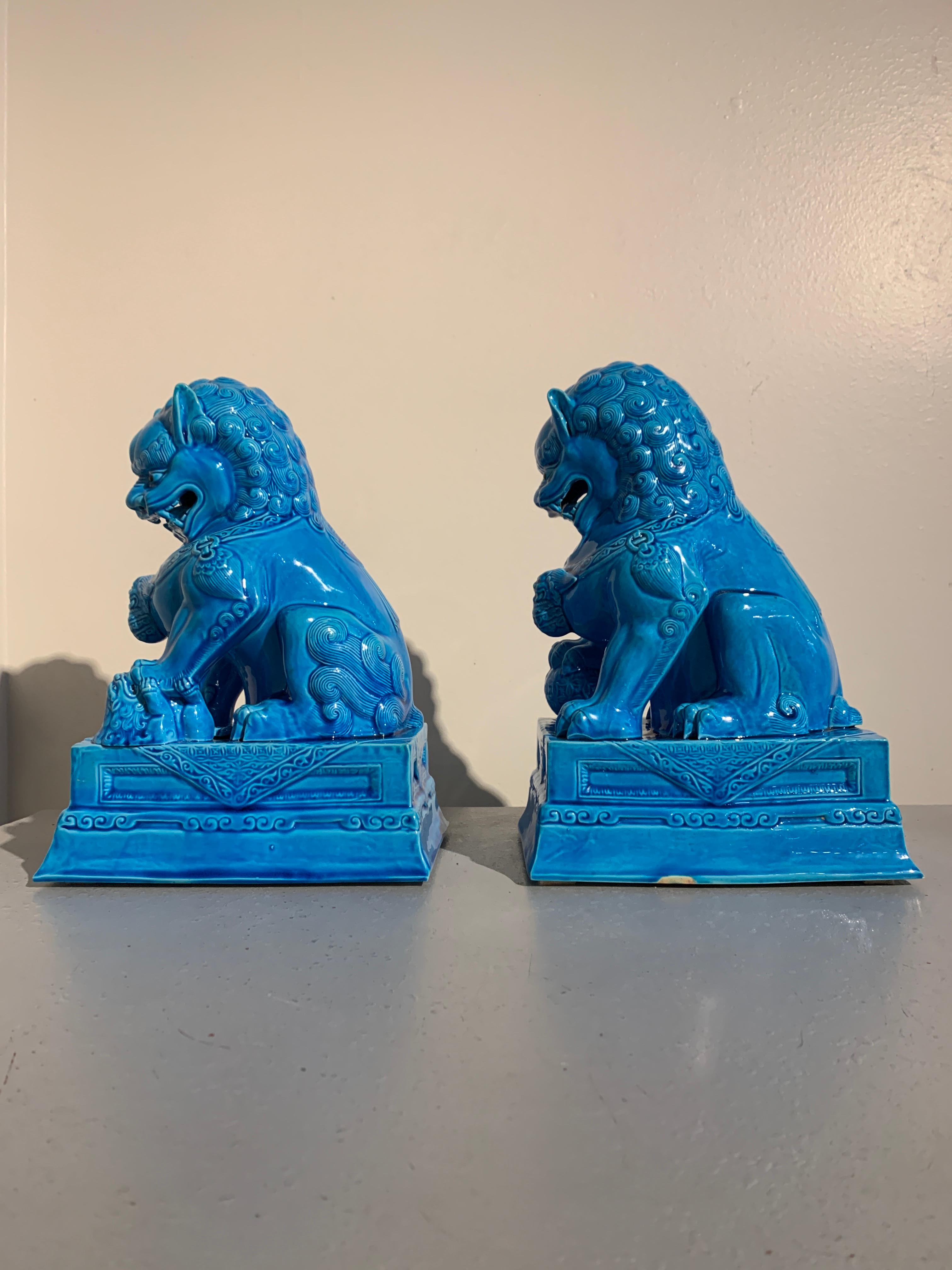 Late 20th Century Pair of Vintage Chinese Turquoise Glazed Foo Lions, 1980s