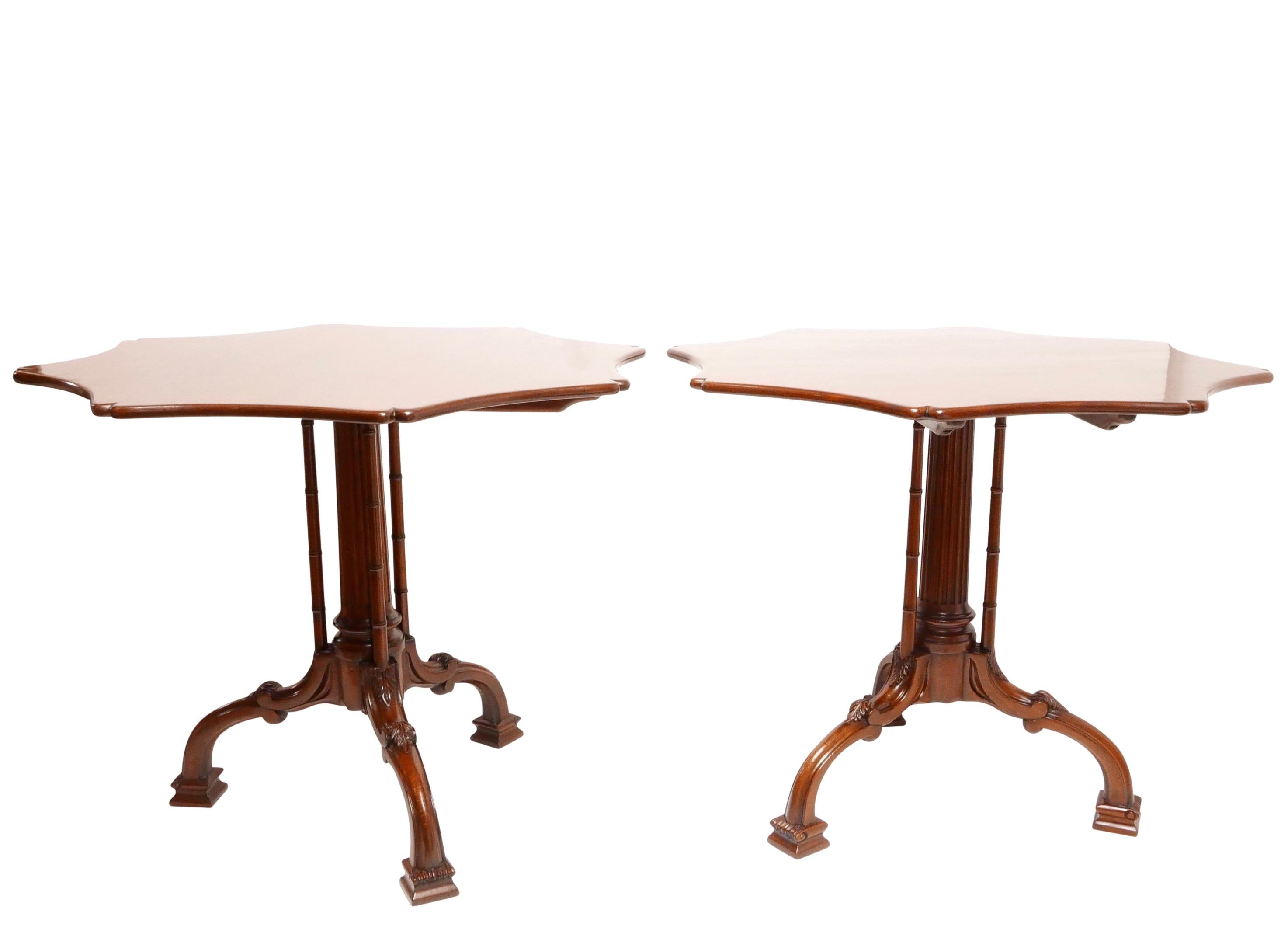 A pair of exquisitely executed Chippendale style mahogany tilt-top tables by Burton Ching of San Francisco, Custom Furniture Maker,
circa 1990.
  