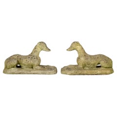 Pareja de estatuas inglesas vintage de piedra fundida para perro de jardín
