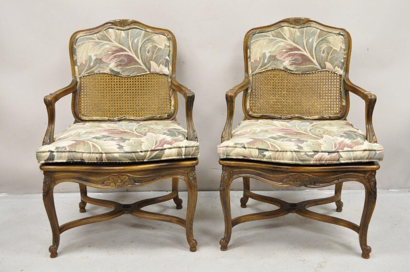 Pair of Vintage French Country Louis XV Style Upholstery and Cane Nicely Carved Lounge Arm Chairs. Circa Mid to Late 20th Century. Measurements: 37