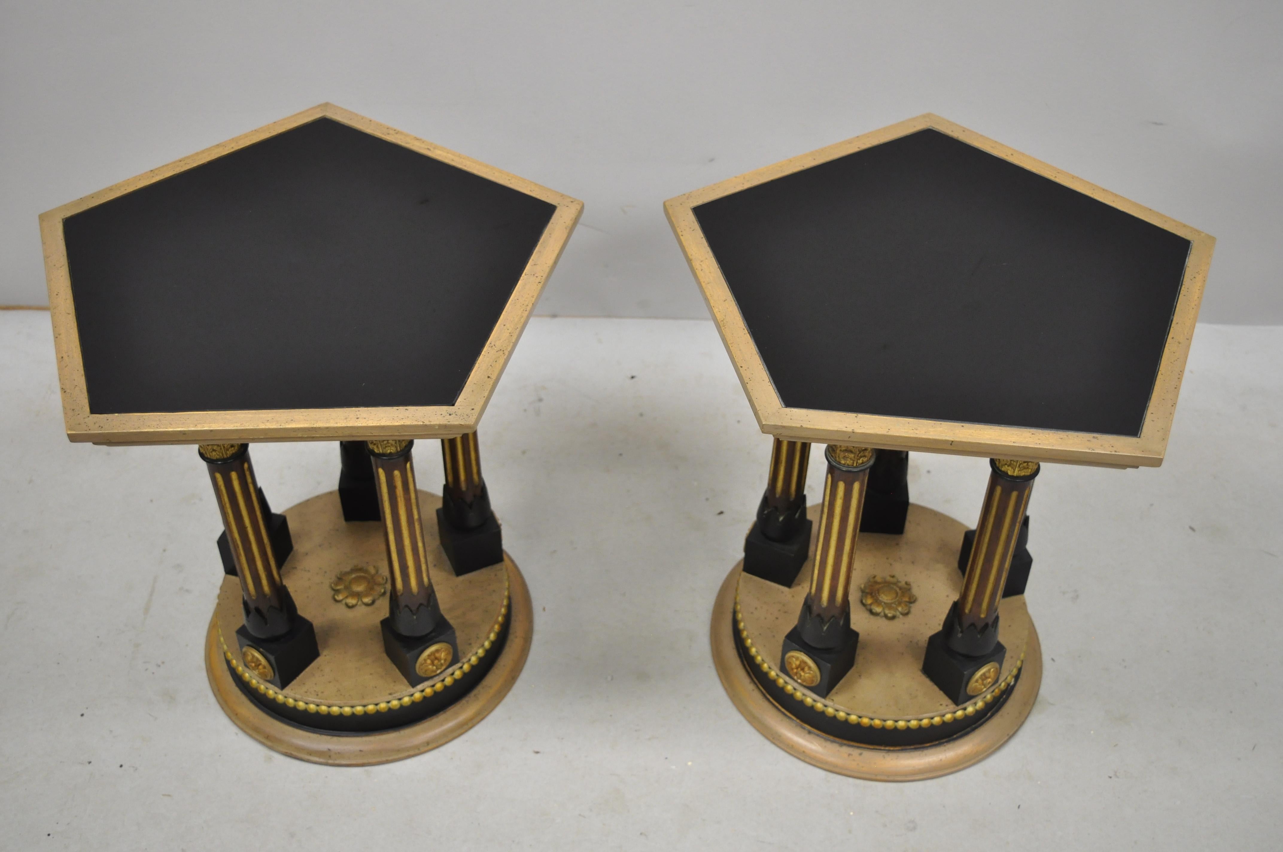 Pair of vintage French empire black gold Corinthian column glass top hexagon small side tables.
Listing includes black glass tops, Corinthian column-form supports, hexagonal top, great style and form, circa mid-20th century. Measurements: 18.5