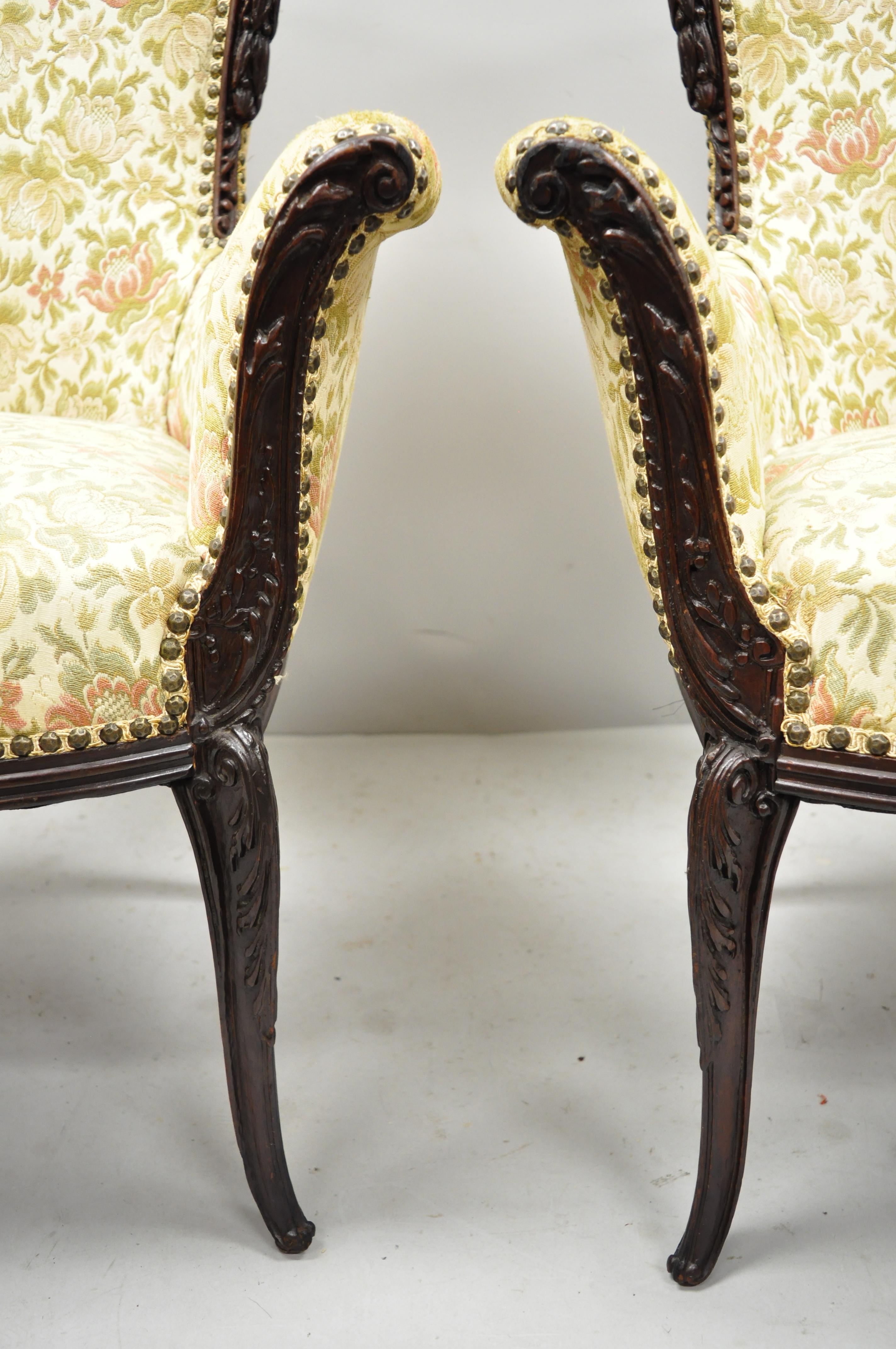 20th Century Pair of French Hollywood Regency Carved Mahogany Fireside Lounge Armchairs