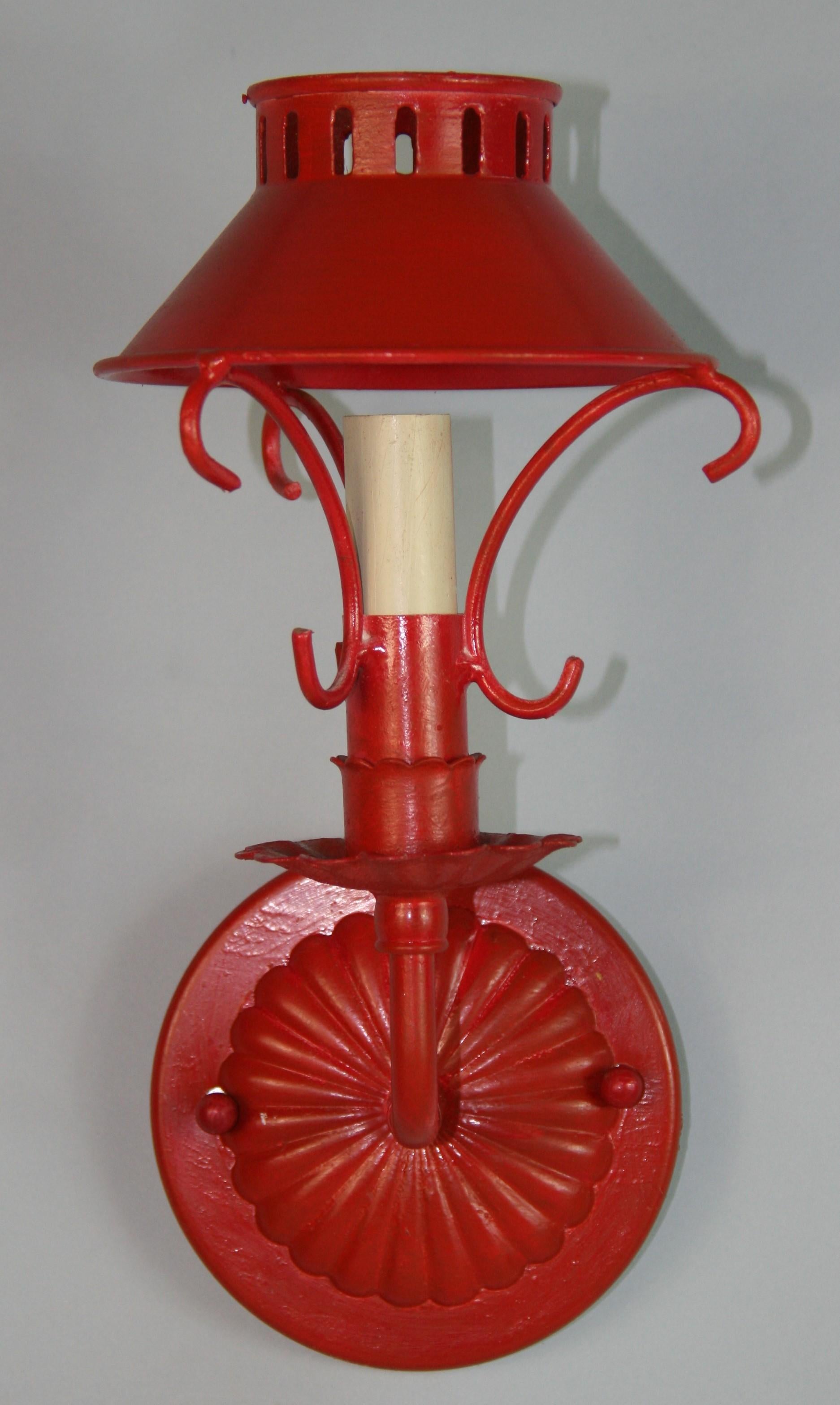 1583 Vintage  Pair French tole sconces with metal shades in a Venetian Red finish
Newly rewired
Takes on 60 watt candelabra based bulb
3 pair available
Priced per pair 