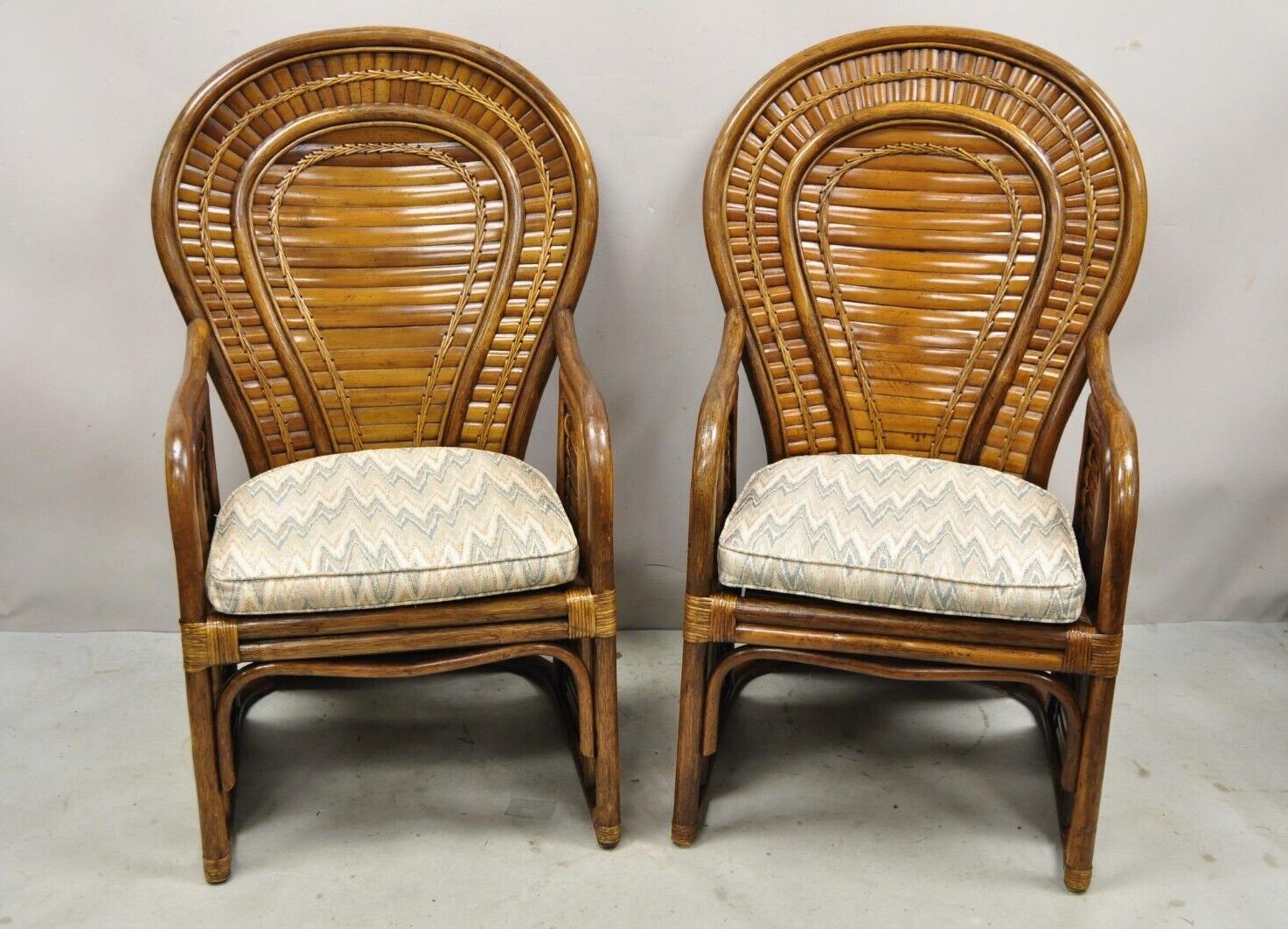 Pair Vintage Hollywood Regency Boho Chic Bentwood Rattan Fan Back Lounge Chairs. Item features shapely fan backs, bentwood frames, loose cushions, sleek sculptural form. Circa  Late 20th century. Measurements: 44