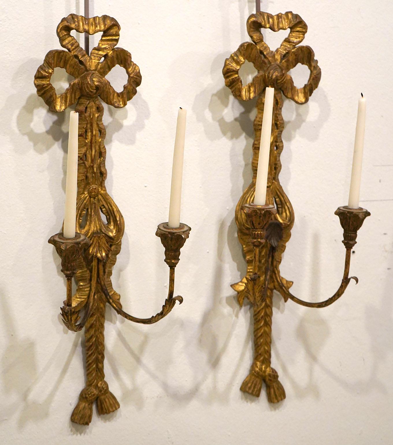 Pair of vintage Italian carved wood and gilt sconces. Mid 20th two arm sconces. 