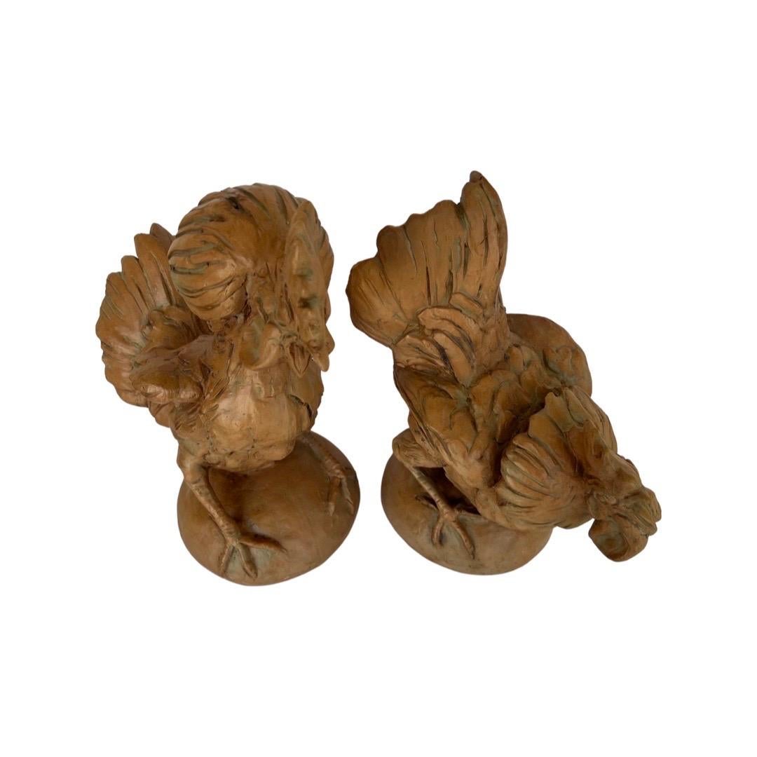 Pair, vintage Italian opposing roosters or chicken form statues in terracotta. Unmarked.