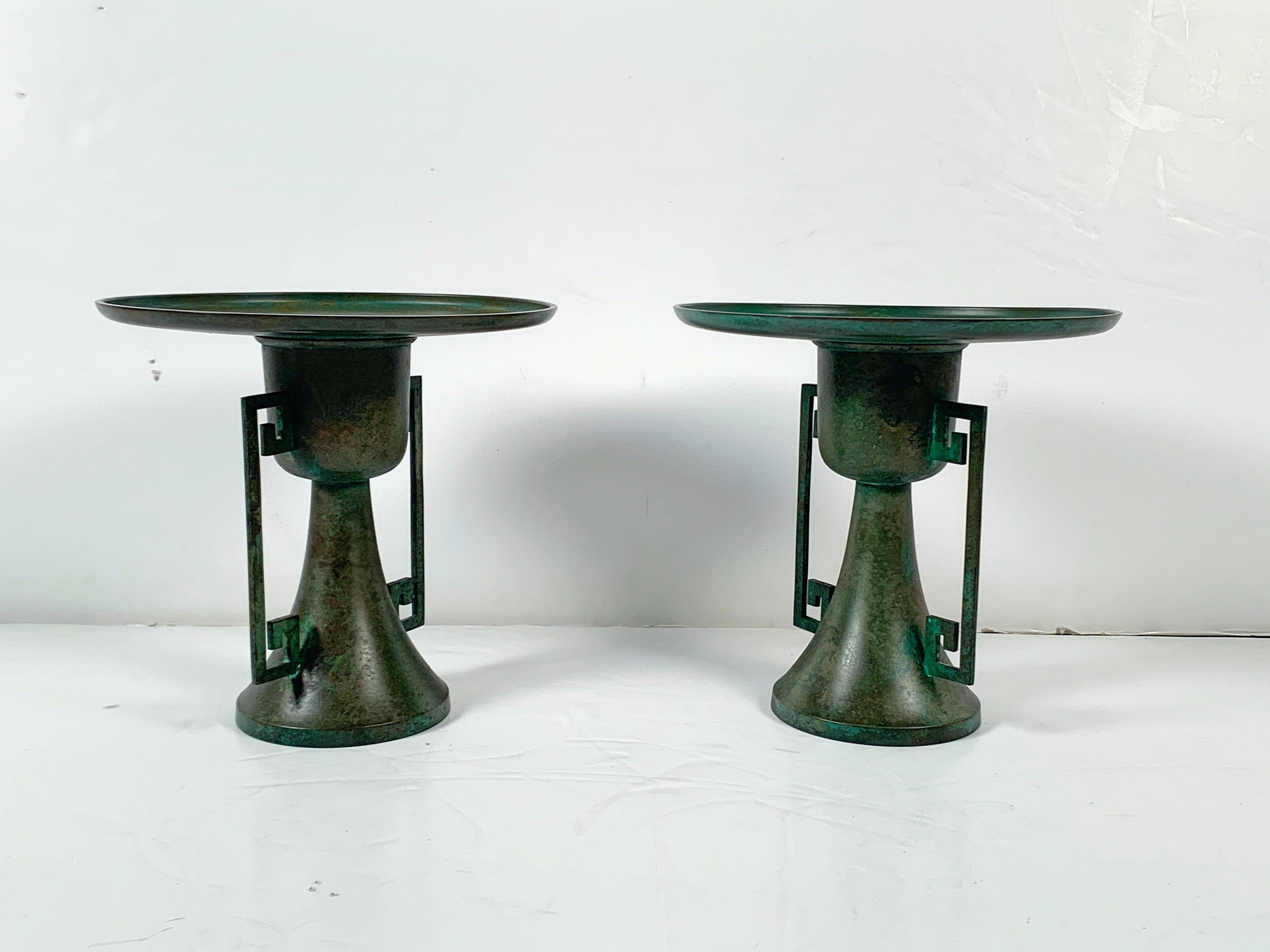 A striking and stylish pair of vintage Japanese cast and patinated bronze usubata, vessels for ikebana flower arranging, early to mid-20th century, Japan. 

The pair of tall vessels each in two sections. The vessel of circular form with a deep