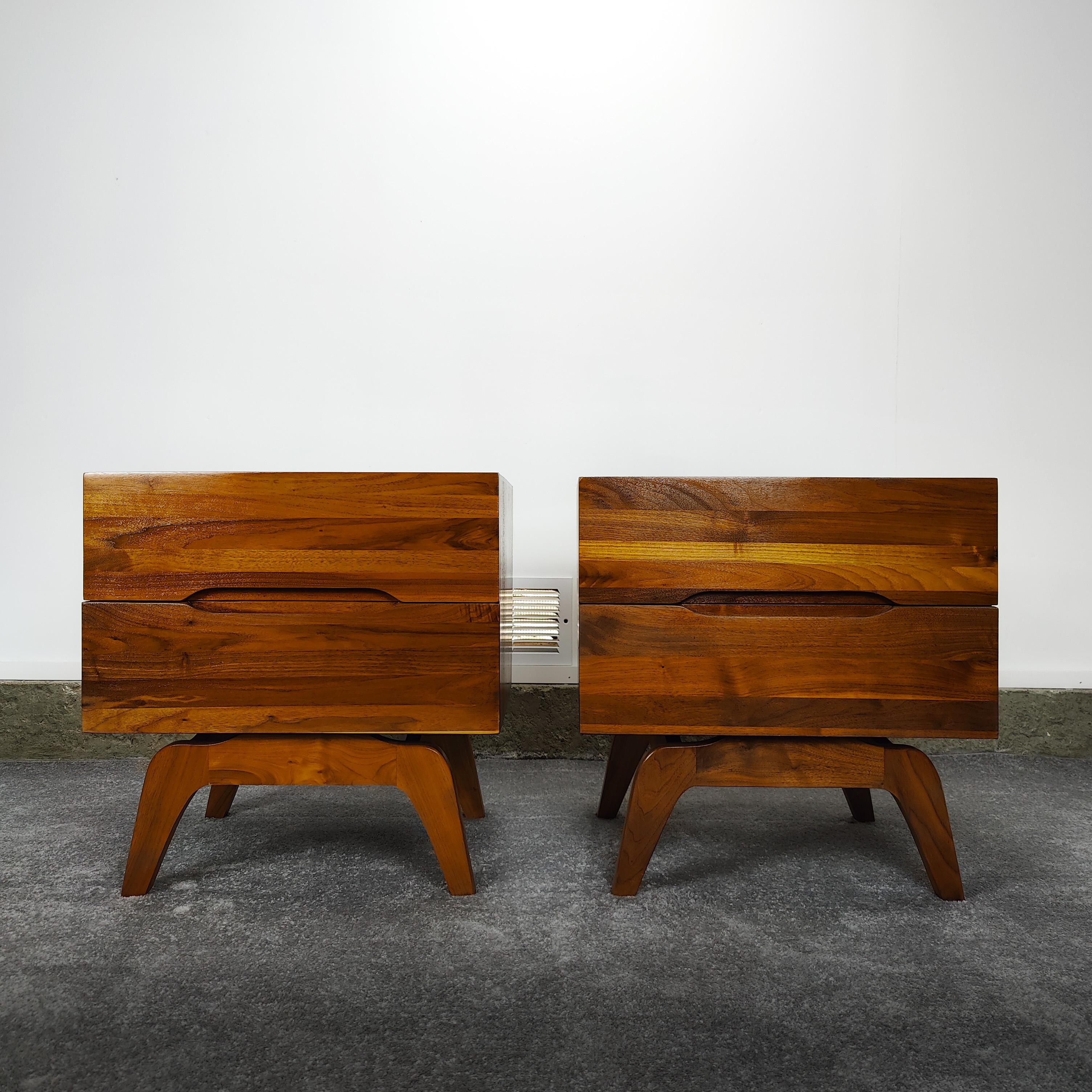 Immerse yourself in the nostalgic charm of the 1960s with this exquisite pair of vintage mid-century modern nightstands. Crafted with an undeniable attention to detail, these pieces are a genuine reflection of the era's iconic design