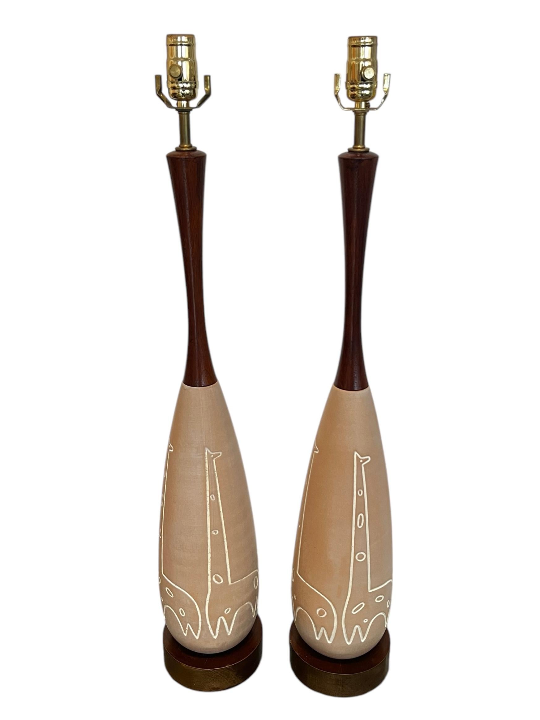 Pair Vintage Mid-Century Raymor Ceramic Giraffe Motif Table Lamps, 1950's.  Lamps are in overall great vintage condition with age appropriate wear,  Lamps measure approx. 33.5