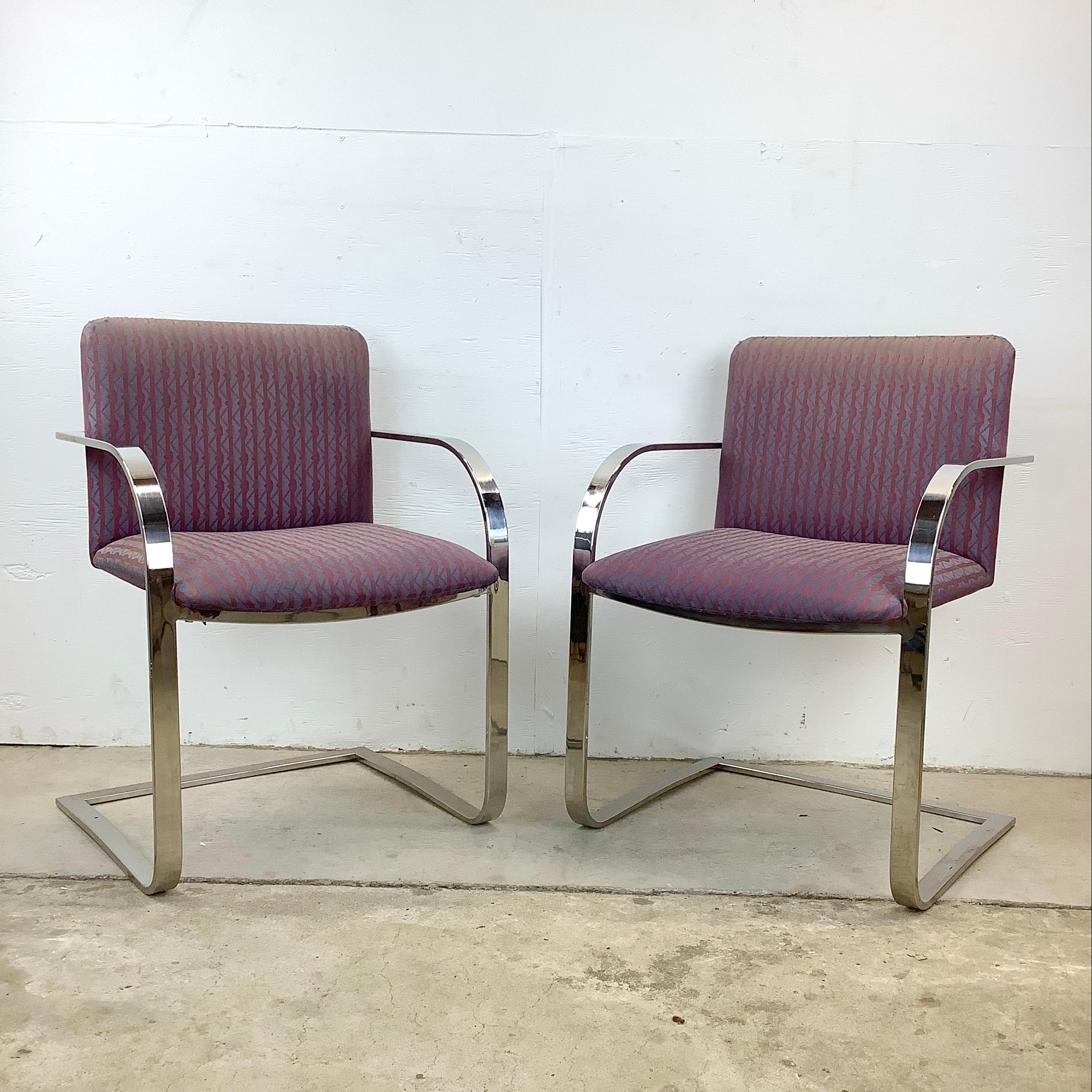 This matching pair of Vintage Brno Style Flat Bar Side Chairs are designed with a nod to the legendary Mies van der Rohe. These comfortable and striking chairs embody the minimalist ethos of the Bauhaus and Mid-Century styles. Each chair has been