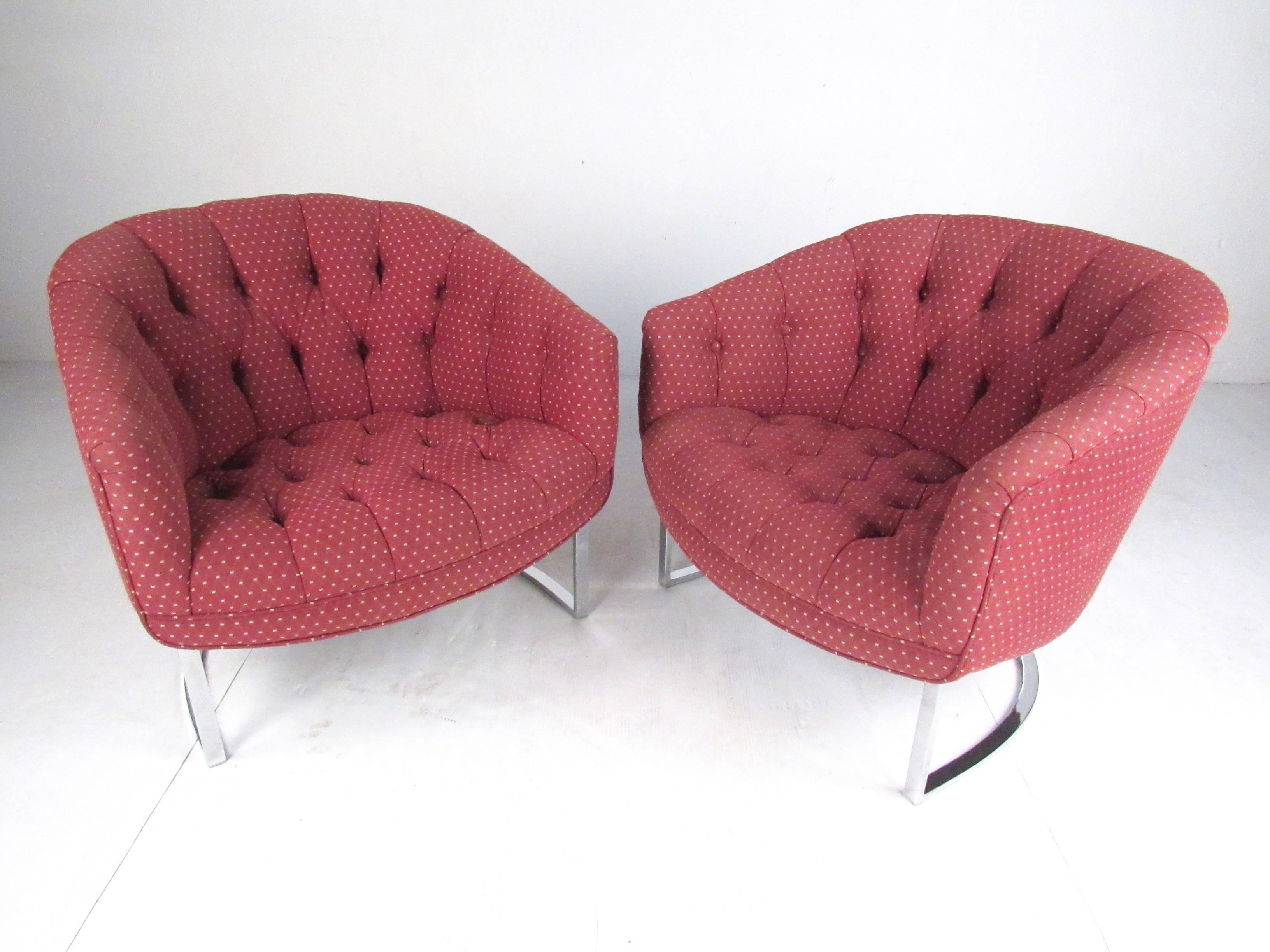 This stylish pair of Mid-Century Modern club chairs feature Milo Baughman style chrome frames, tufted fabric, and comfortable barrel back seats. Plush and stylish seating for home or business seating arrangement, please confirm item location (NY or