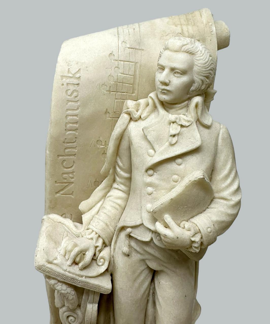 20ième siècle Paire de sculpteurs musiciens masculins d'antiquités serre-livres Wolfgang Amadeus Mozart en vente