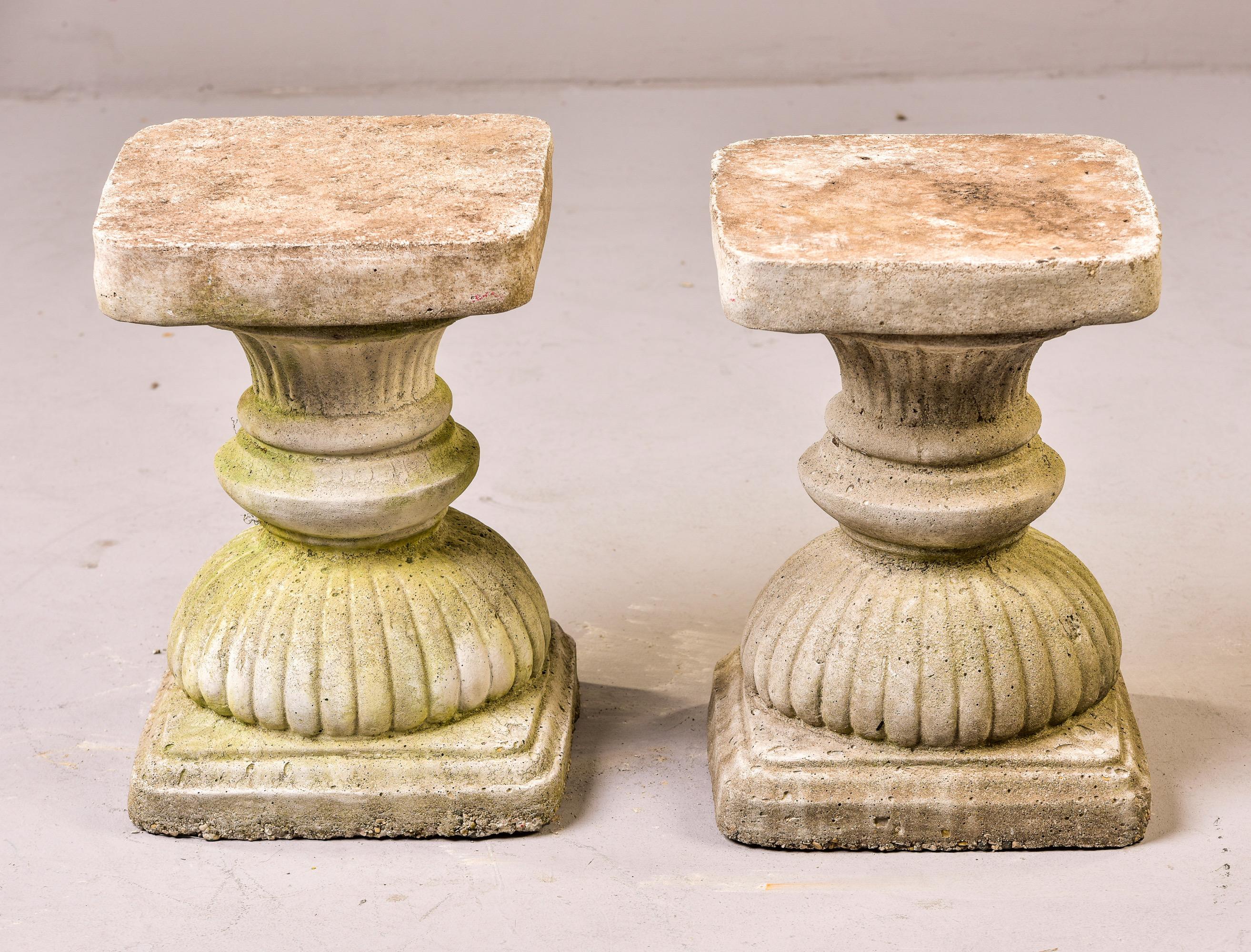 Pair of circa 1960s neoclassical style cast stone/cement garden pedestals with age/patina/moss. Unknown maker. Sold and priced as a pair.