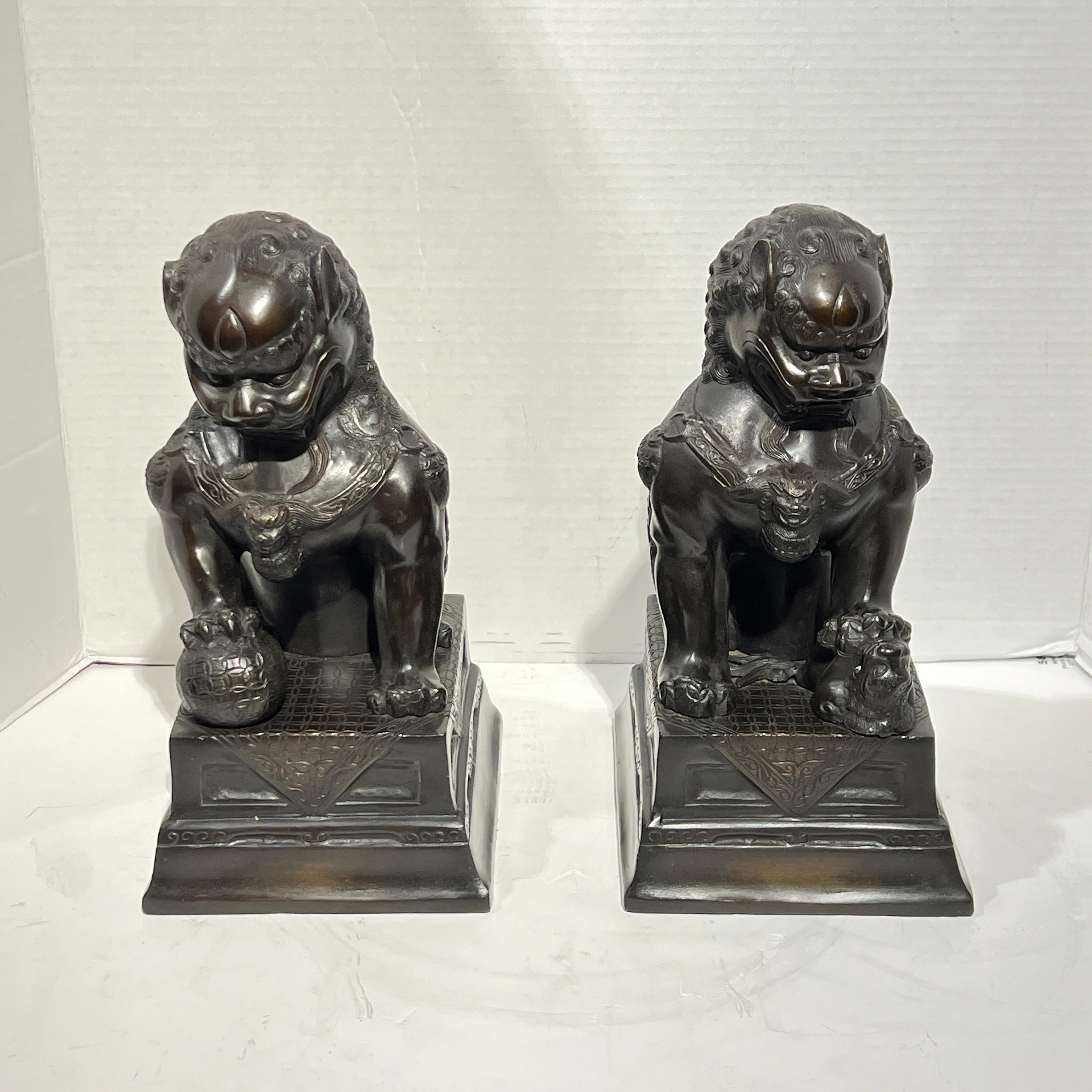 20th Century Pair Vintage Patinated Metal Foo Lion Sculptures For Sale