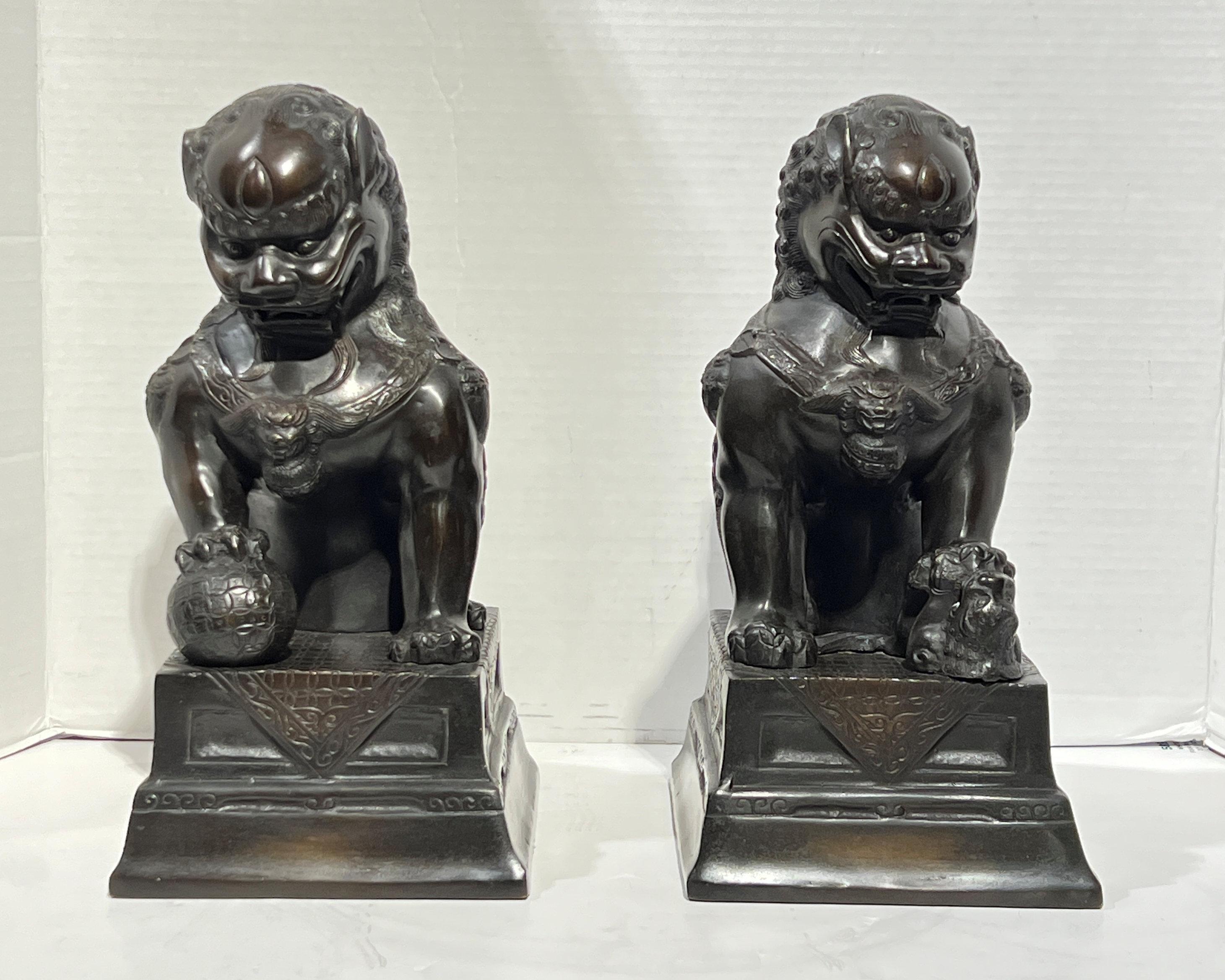 Pair Vintage Patinated Metal Foo Lion Sculptures For Sale 1