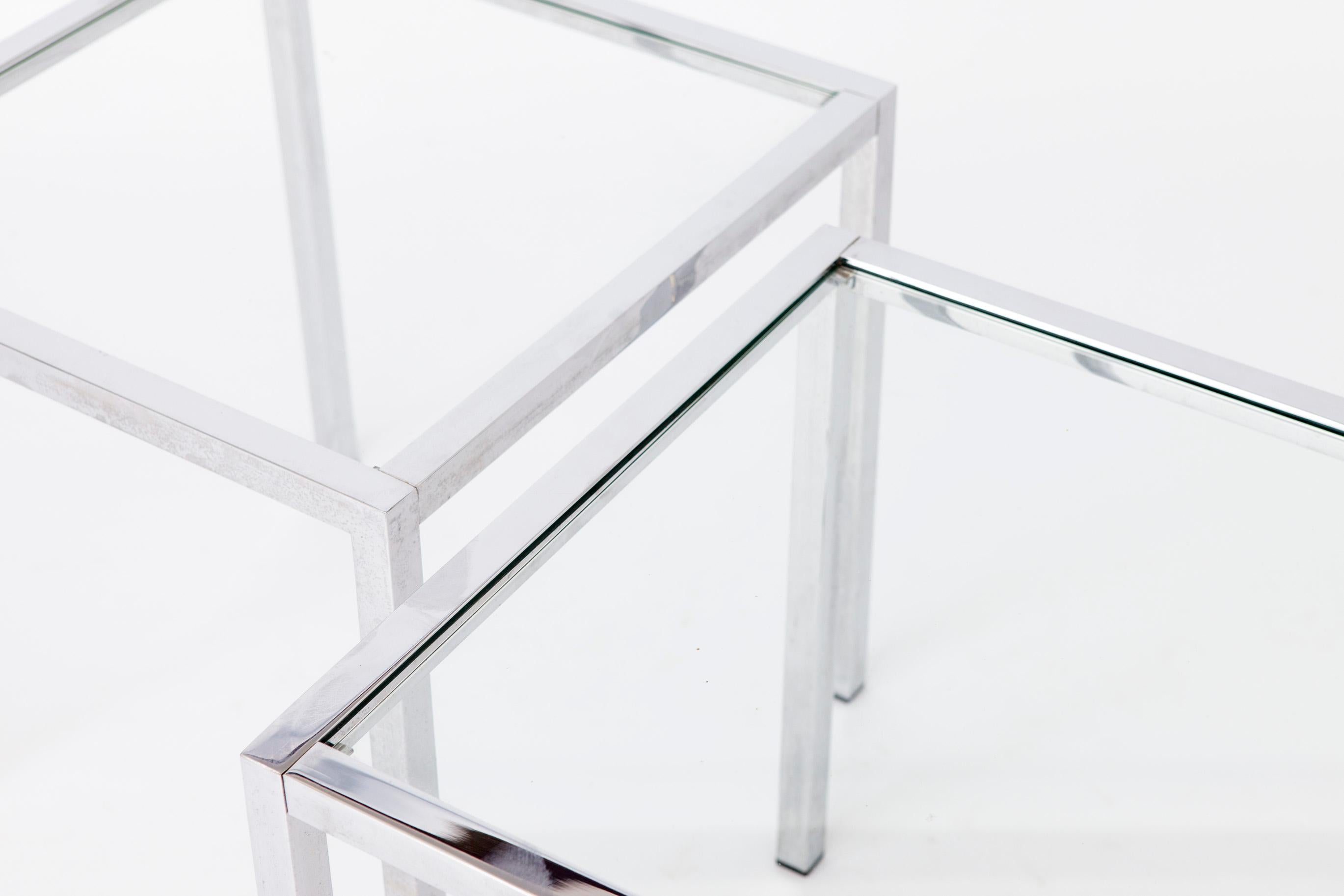 Vintage Side Tables from the 1970s

These elegant side tables feature chromed metal frames paired with a sleek glass top, exuding timeless style. The listed price is for both tables, which are in overall good vintage condition.