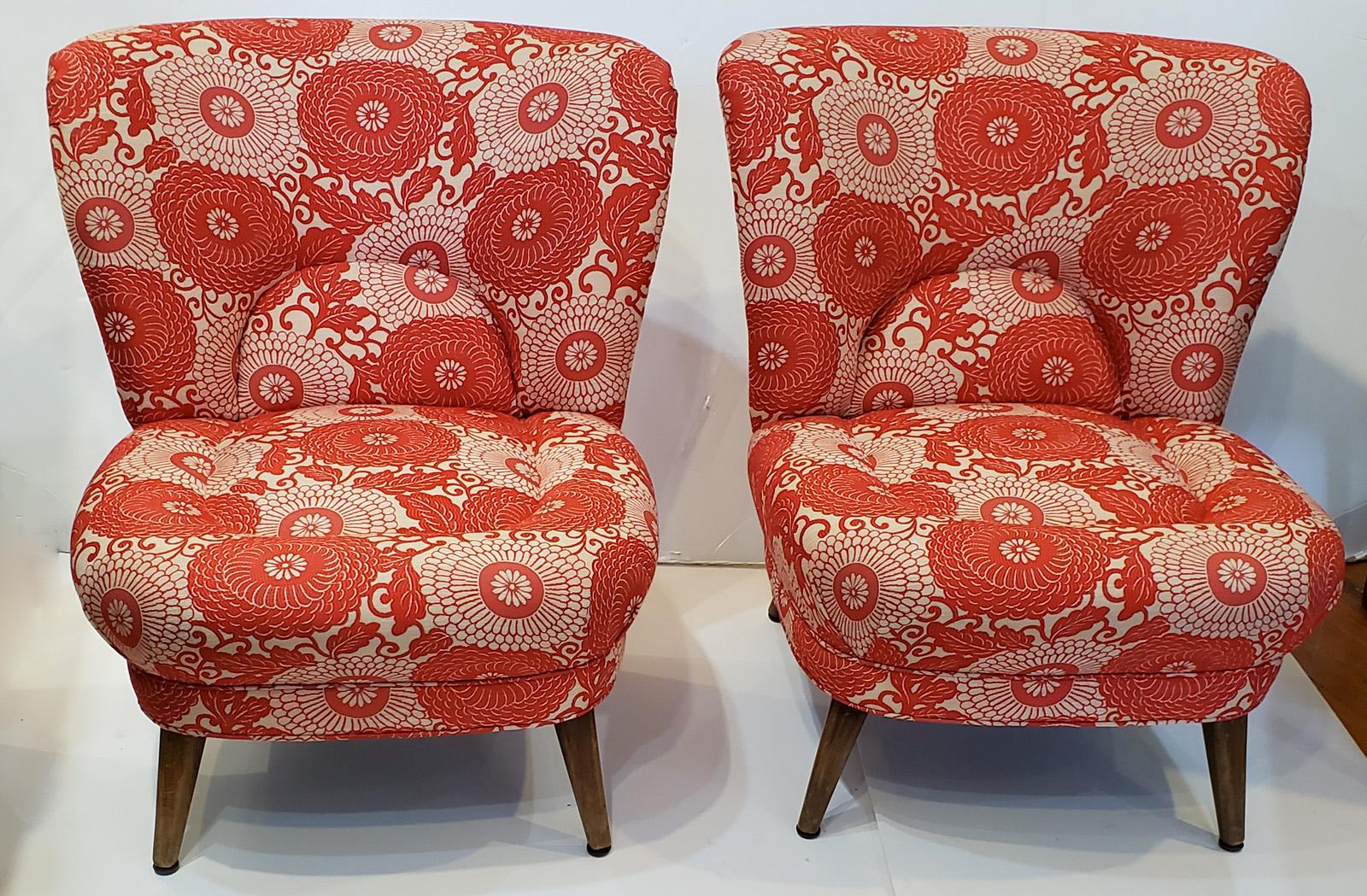 Attractive pair of low lounge or slipper chairs from Sweden, circa 1950.
Newly upholstered. No loose cushions. Very comfortable due to shaped
backs. Beechwood legs.

  