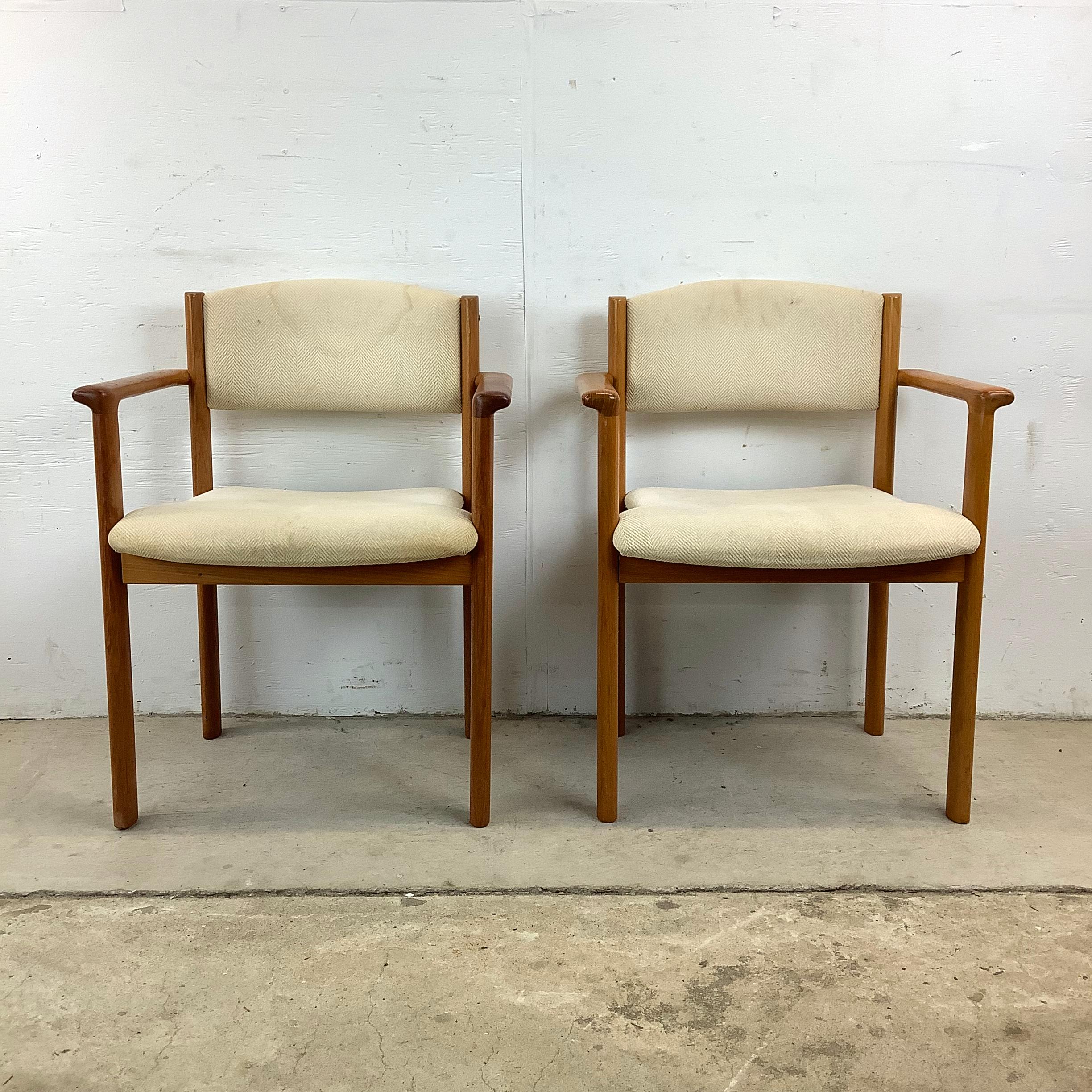 This captivating duo make a great addition to any home or office – they are a unique pair of Scandinavian Modern Teak Armchairs. Crafted with sturdy teak frames and adorned with vintage upholstery, these chairs exude the timeless elegance and