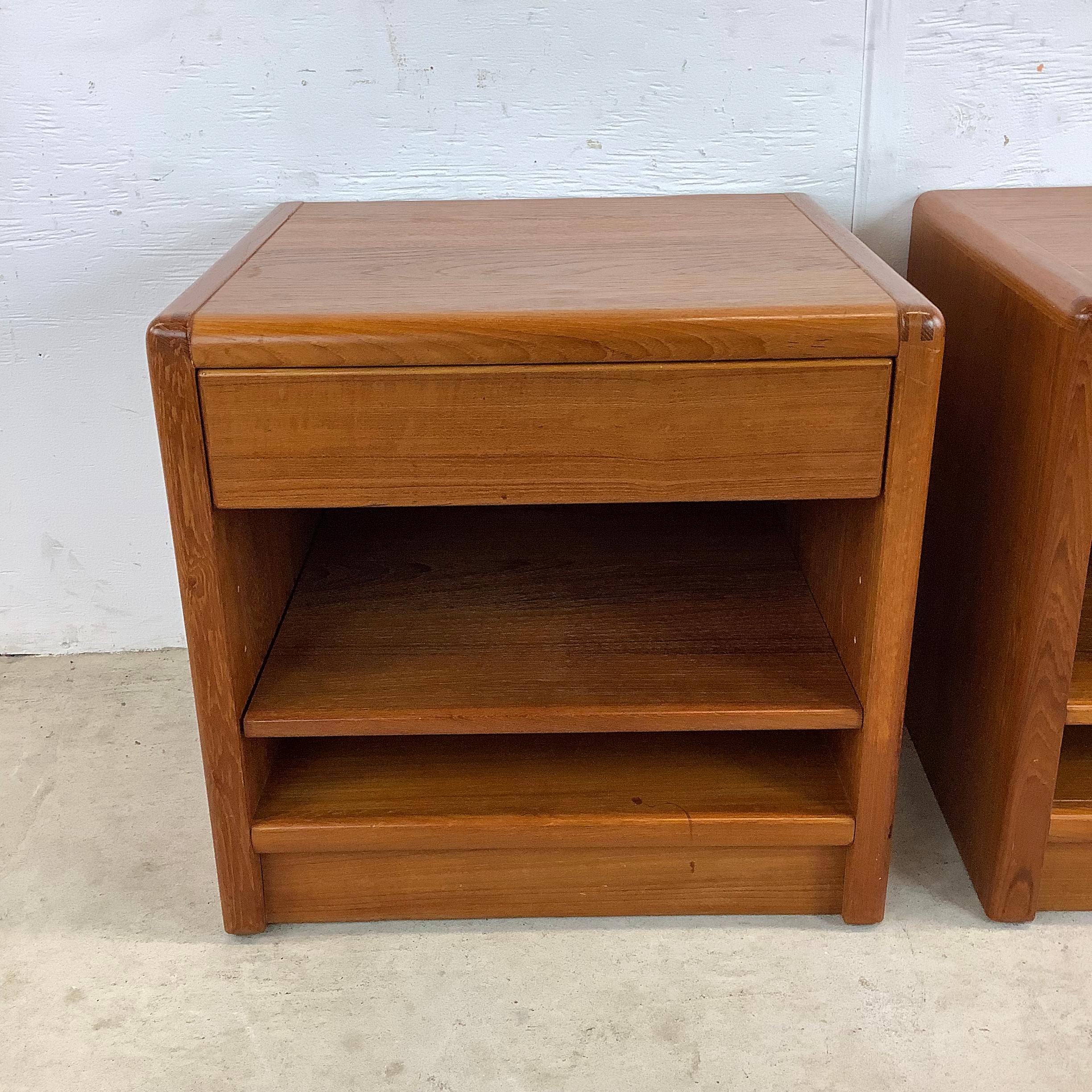 Introducing this pair of exquisite vintage teak nightstands by D-Scan Furniture, where timeless design meets exceptional craftsmanship. These stunning nightstands are the perfect addition to any bedroom, bringing a touch of Scandinavian style