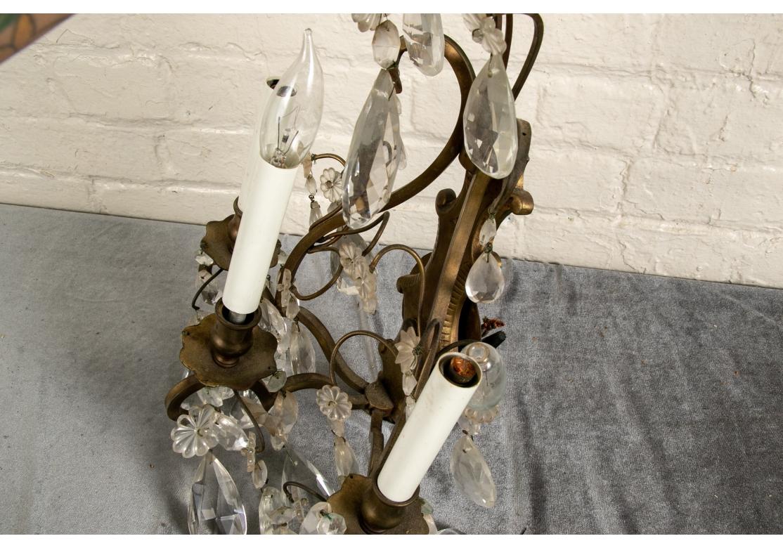20ième siècle Pair Vintage Three-light Brass And Crystal Sconces en vente