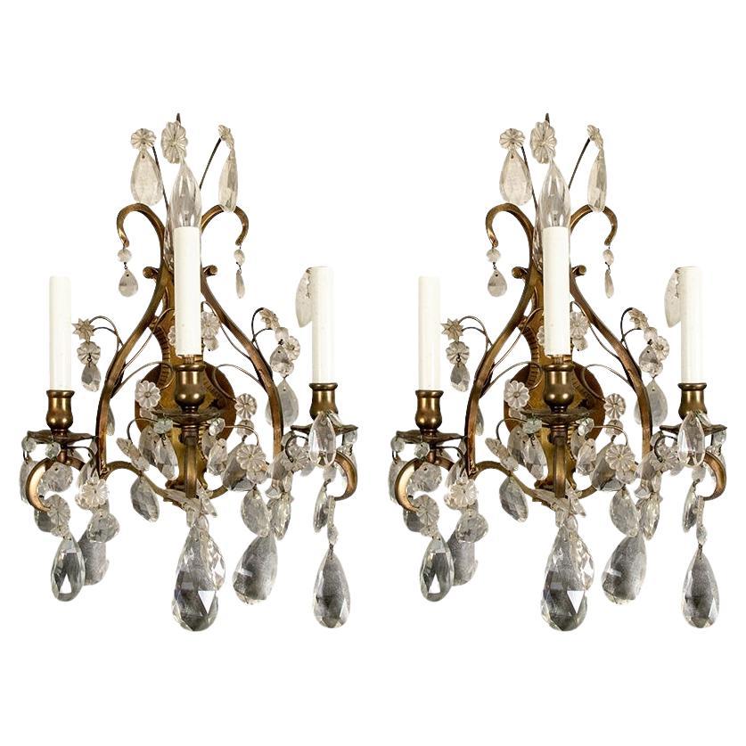 Pair Vintage Three-light Brass And Crystal Sconces en vente