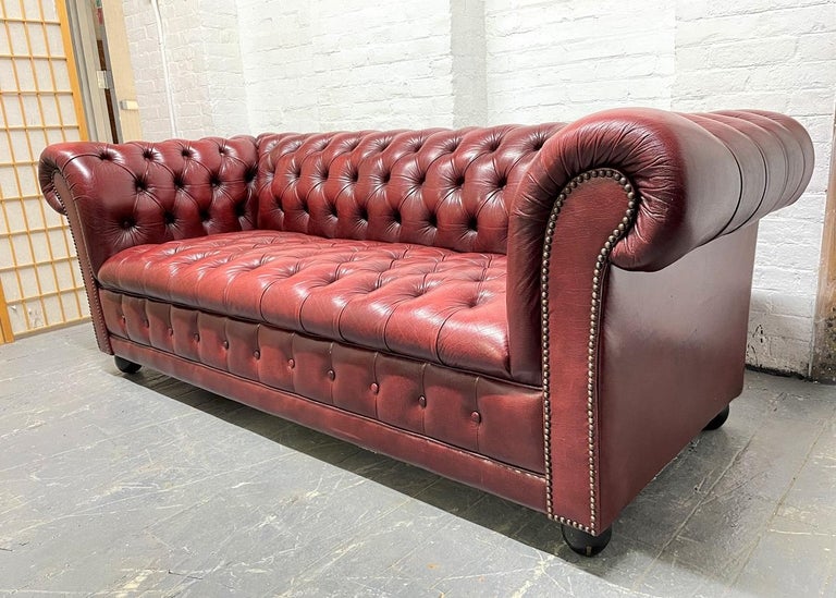 Brass Pair Vintage Tufted Leather Chesterfield Sofas For Sale