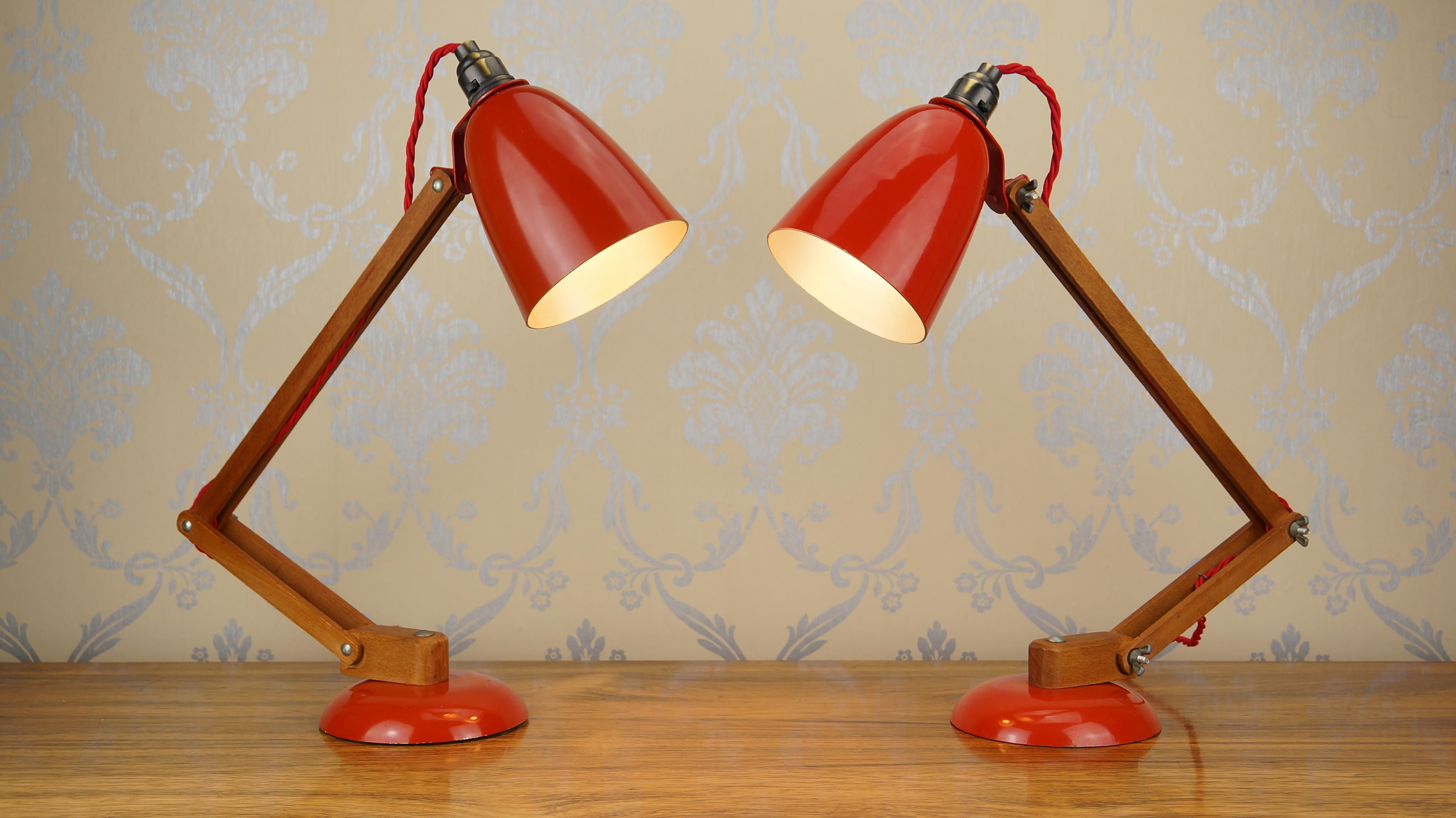 Pair of vintage midcentury Wood Maclamps.
Designed by Terence Conran for Habitat in the late 1950s.

These colorful lamps are in great condition having been completely dismantled to give them a sympathetic revival. The wooden arms have been