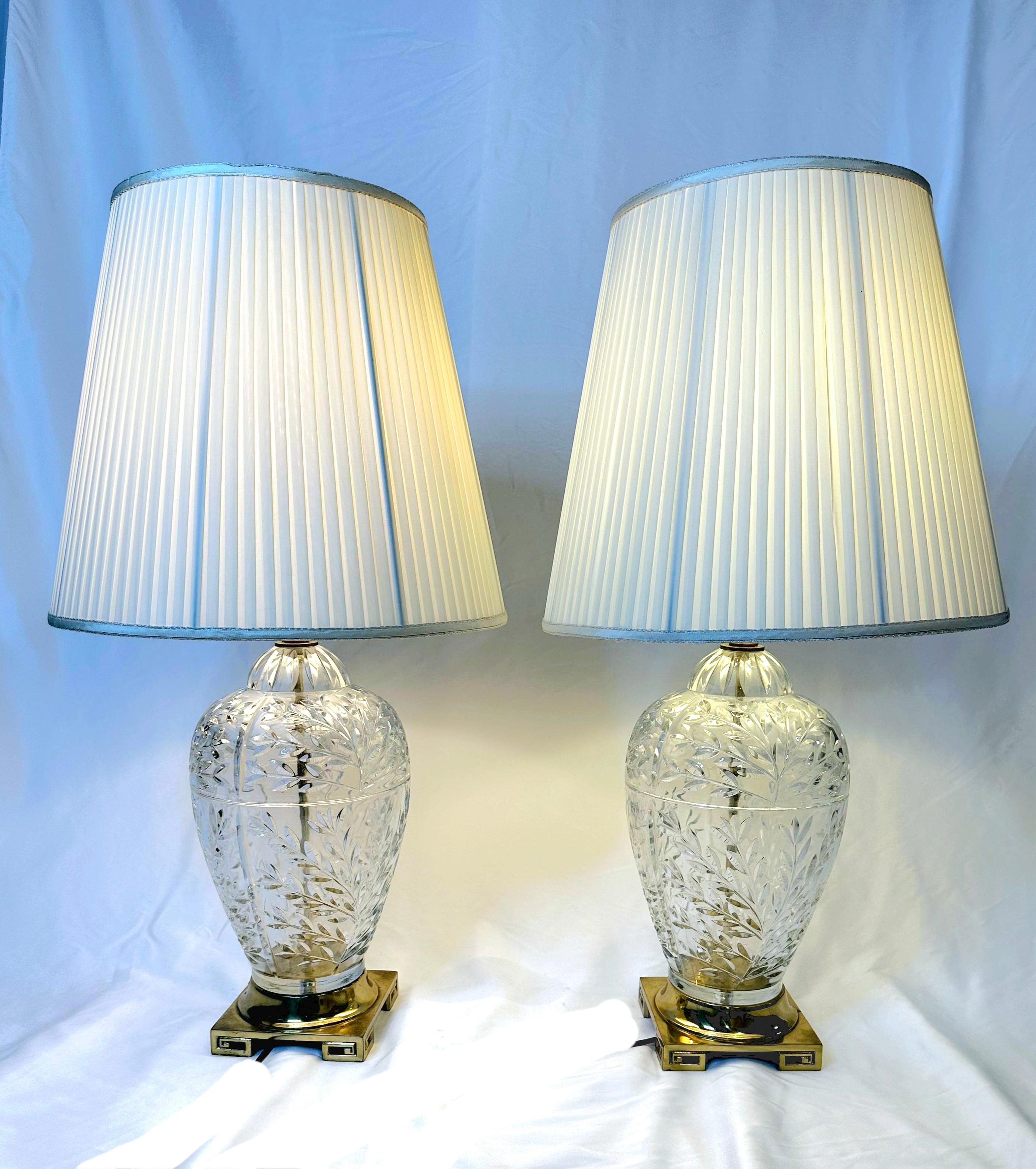 Pair Vintage French style single cut crystal glass bulbous table lamps brass Greek key base. Lamps feature a leafy design bulbous crystal body, brass finish greek key base.
Stunning 60 year old lamps, look brand new.
Quality craftsmanship, great