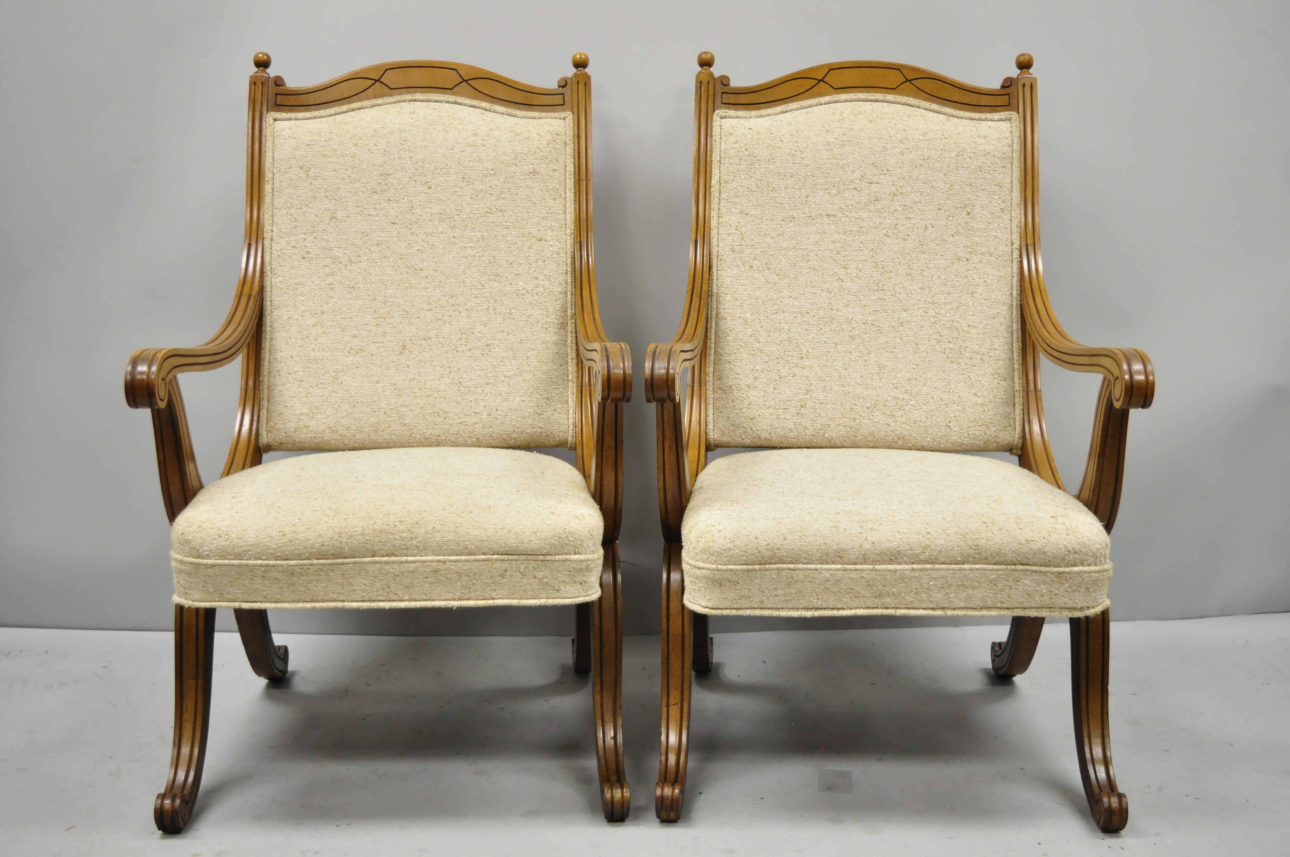 Pair of vintage Hollywood Regency Curule Savonarola upholstered back X-frame armchairs. Items feature Curule 