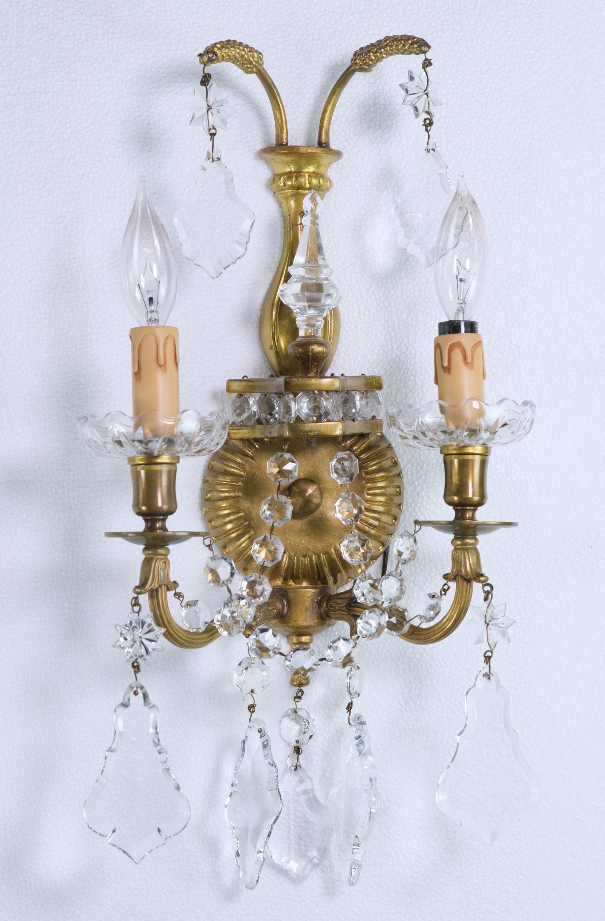 20th Century pair of brass and crystal sconces retrieved from the Herbert Hoover Suite in the NYC Waldorf Astoria Hotel on Park Ave. Cleaned and restored. Small quantity available at time of posting. Priced each. Please inquire. Please note, this
