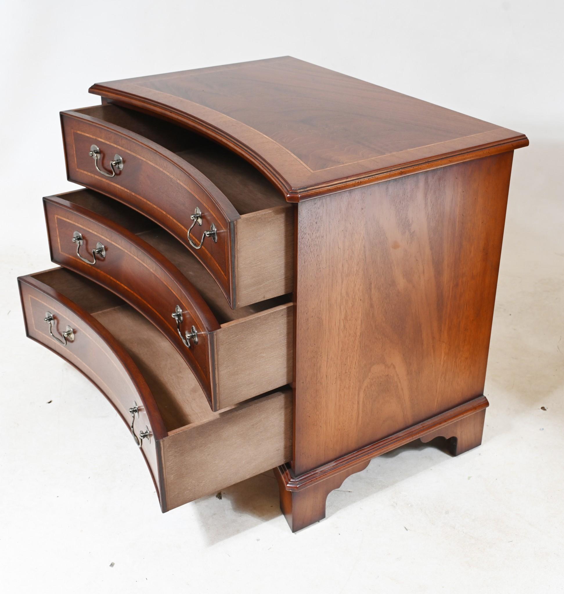 You are viewing an elegant pair of Regency manner bedside chests
Hand crafted from walnut with sumptuous patina
Features a ebonized trim around the drawers and to the top which
really accentuates the shape and design
Brass handles and fixtures are