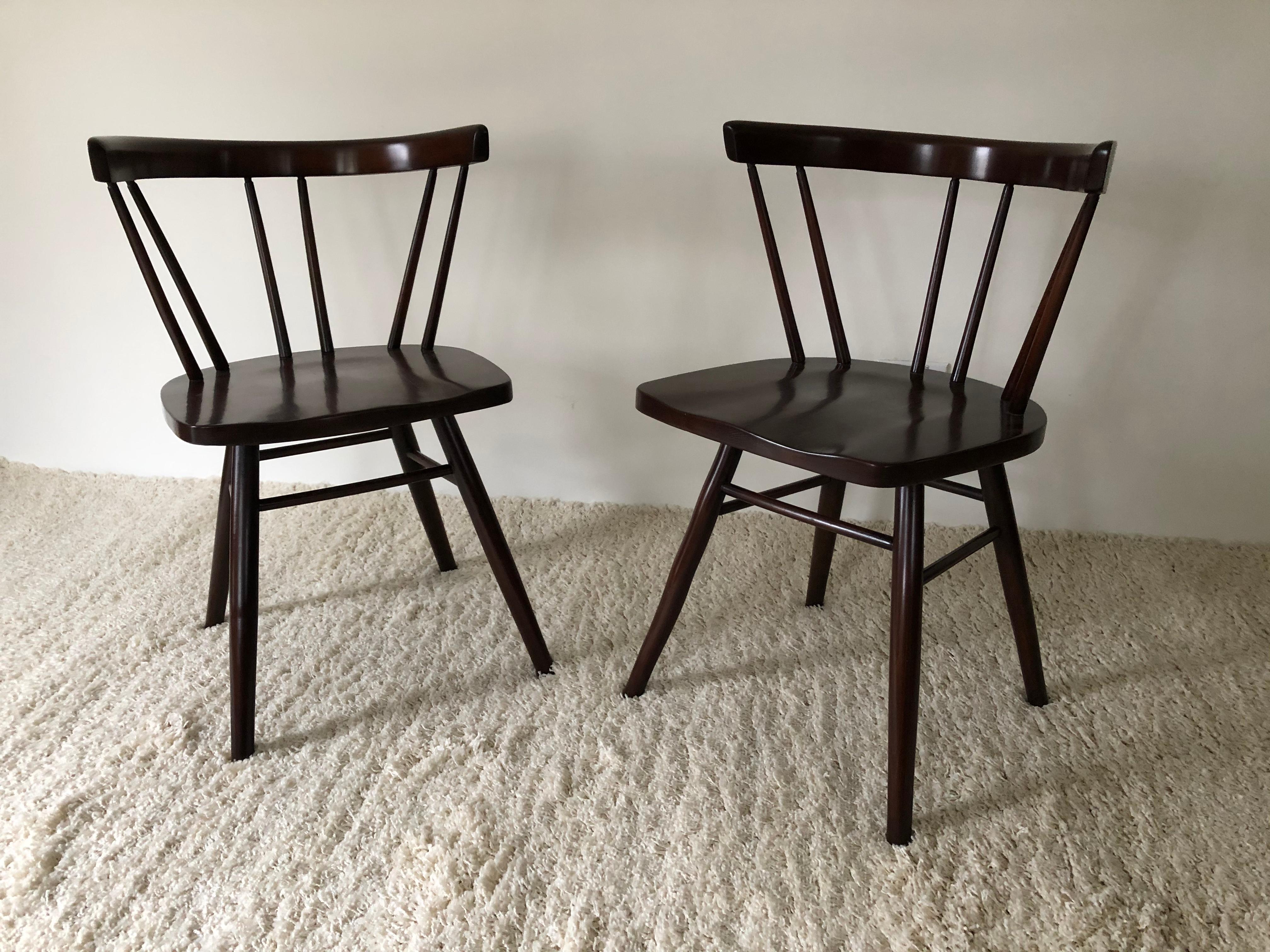 Pair of George Nakashima style walnut midcentury chairs.