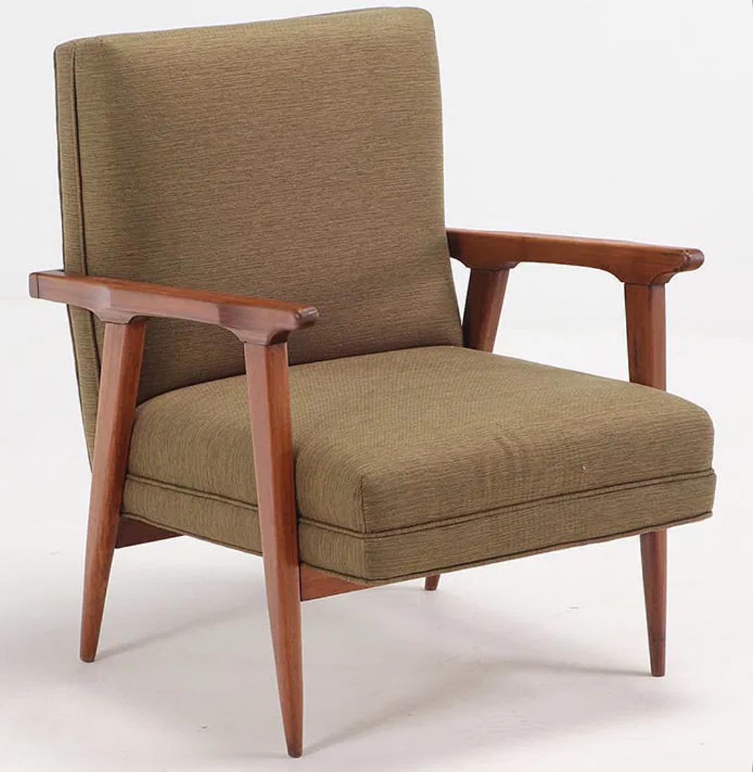 These architecturally designed Mid-Century Modern open-arm lounge chairs offer timeless style suited for both home and office settings. The clean lines and sculptural form reflect the era’s iconic aesthetic, while the newly upholstered