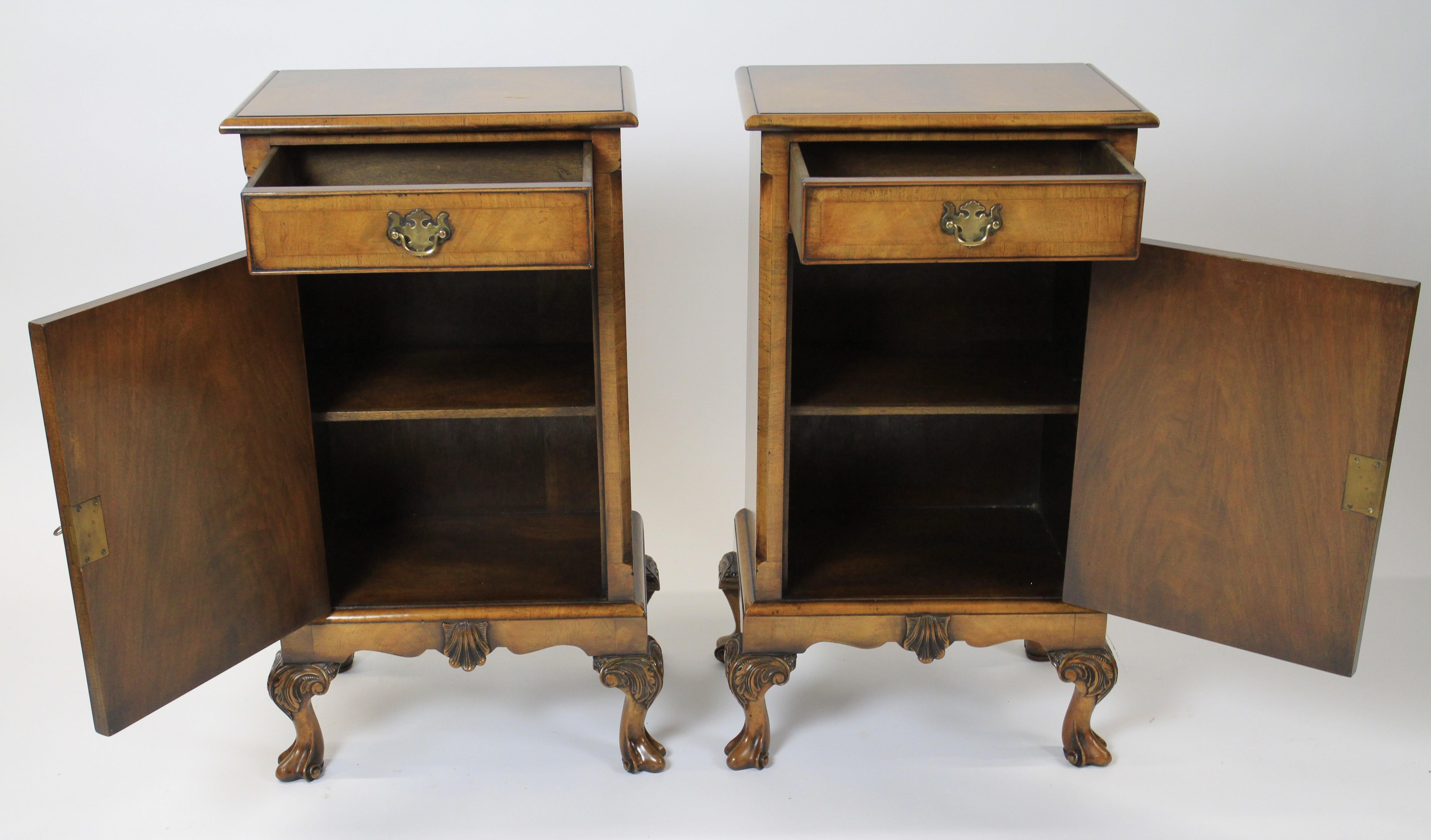 Pair Walnut Queen Anne style  Bedside Cupboards circa 1930s
Figured walnut tops with thumb mould edge.
single drawer on top. 
Single door with Queen Anne Style mould Arch  detail 
Working locks & keys open to reveal single shelf interior
Shaped