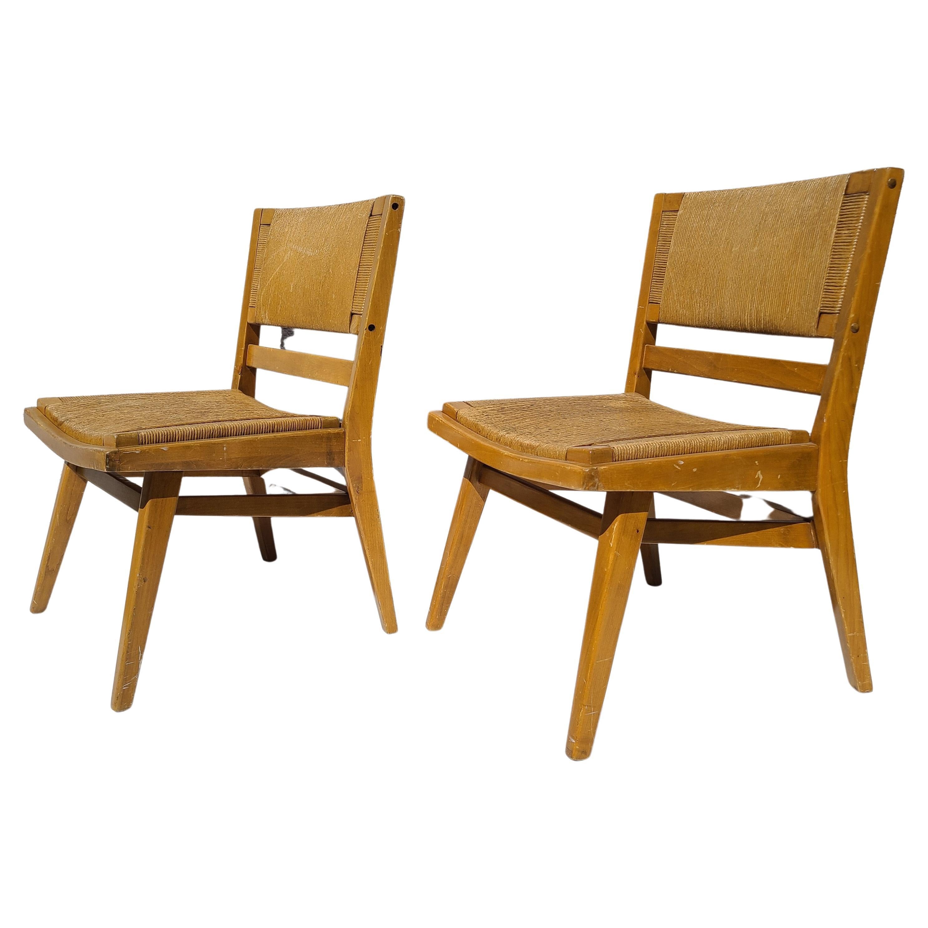 Please message us for a cost effective shipping quote to your location.

Pair Mid Century Modern Tacoma Chairs by Warner Cleveland.
Made by Northwest Chair Company.
Walnut and Rush construction.
Pacific Northwest Japanese-American design influence.