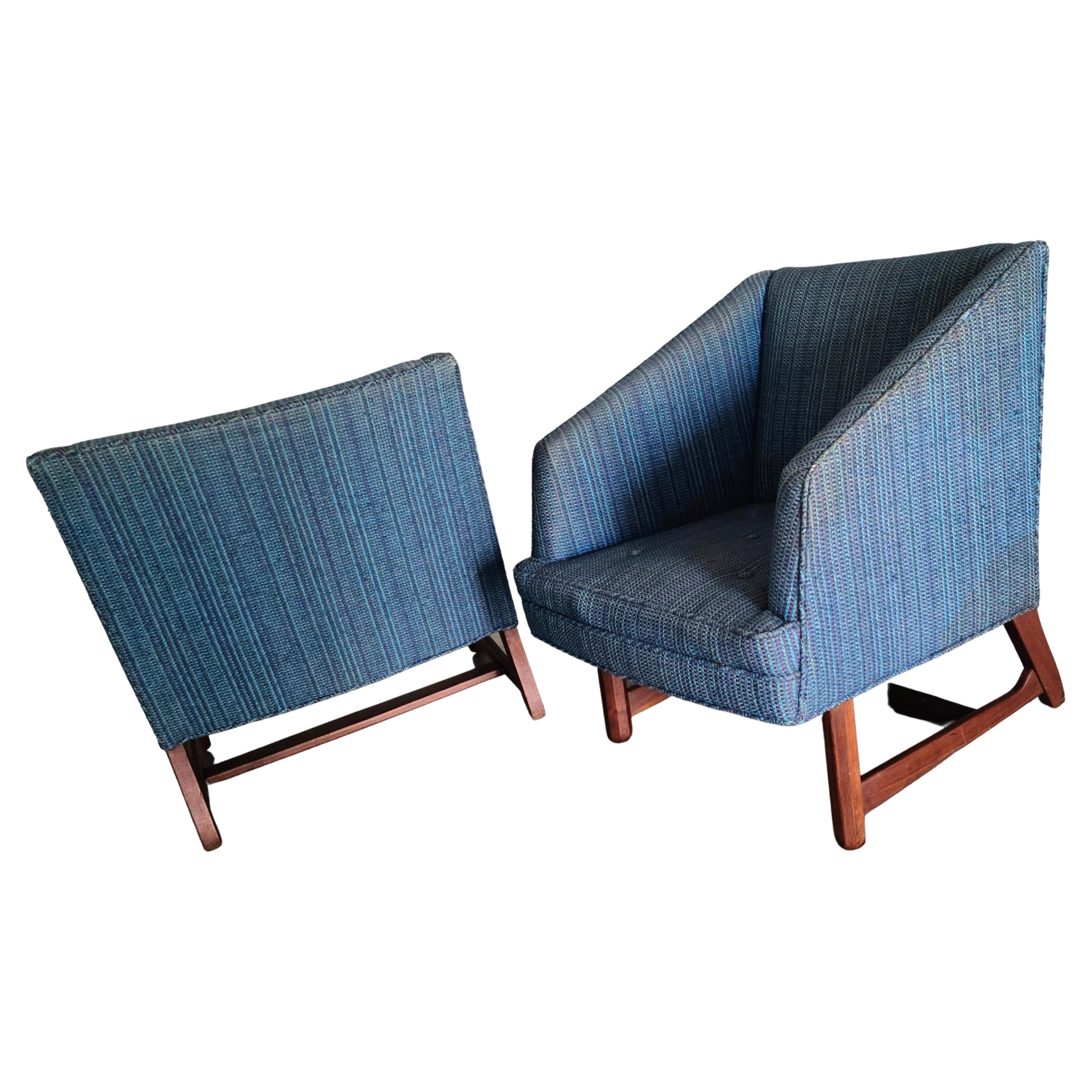 Please feel free to reach out for accurate shipping to your location.

Pair Wedge Lounge Chairs. 
Sculpted Walnut Base. 
Front legs are Octagonal with Ball Point. 
Side to side stretcher in a slightly elliptical shape.

In the style of Edward