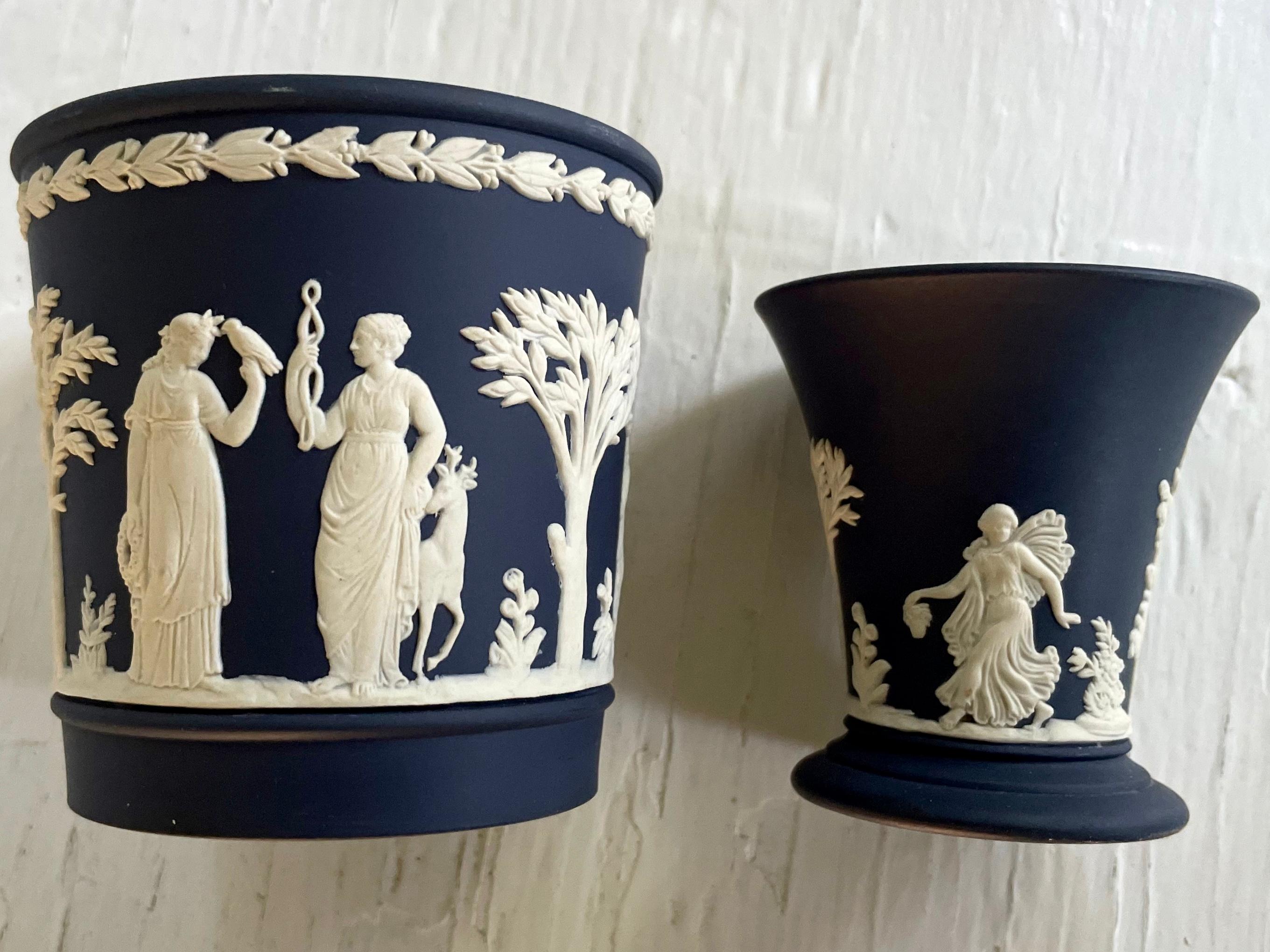 Pair Wedgwood blue and white Jasperware desk accessories. Beautiful blue grey bisque beaker/bud-vase with cream-ivory neoclassical bas relief, perfect for pens and paperclips on an elegant desk. Impressed marks for Wedgwood. England, Mid-20th